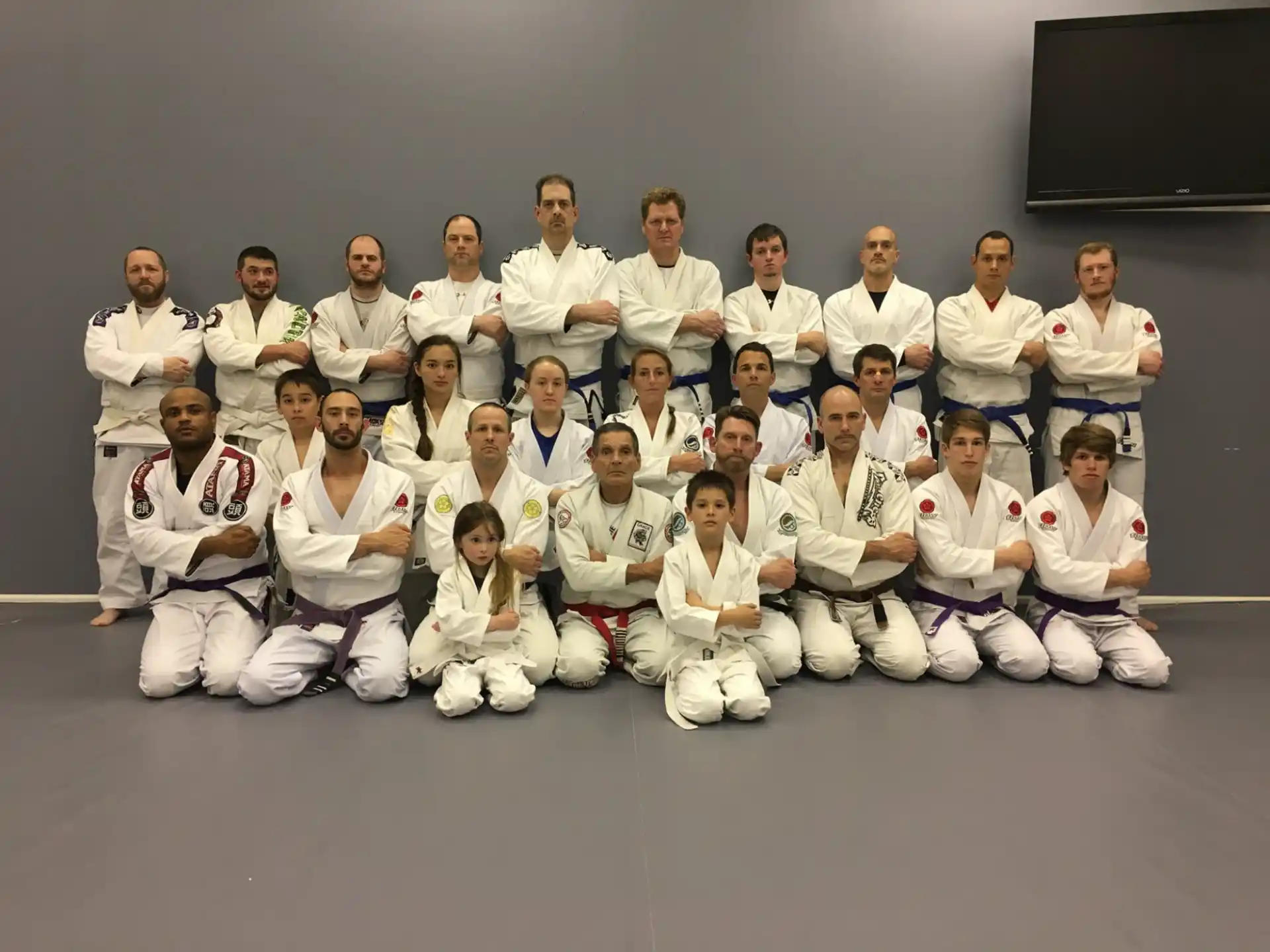 a group of people in white uniforms