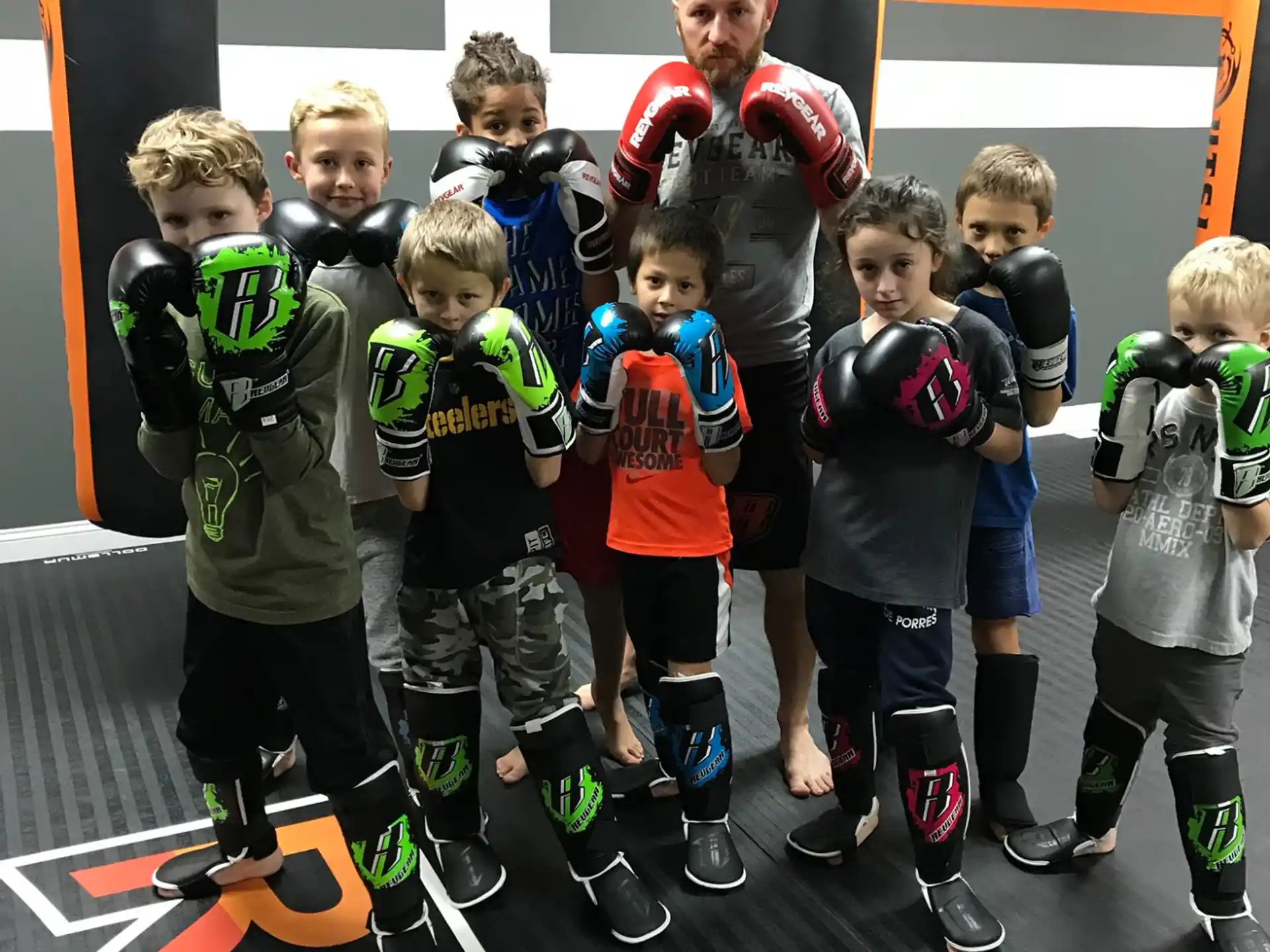 a group of kids in a gym