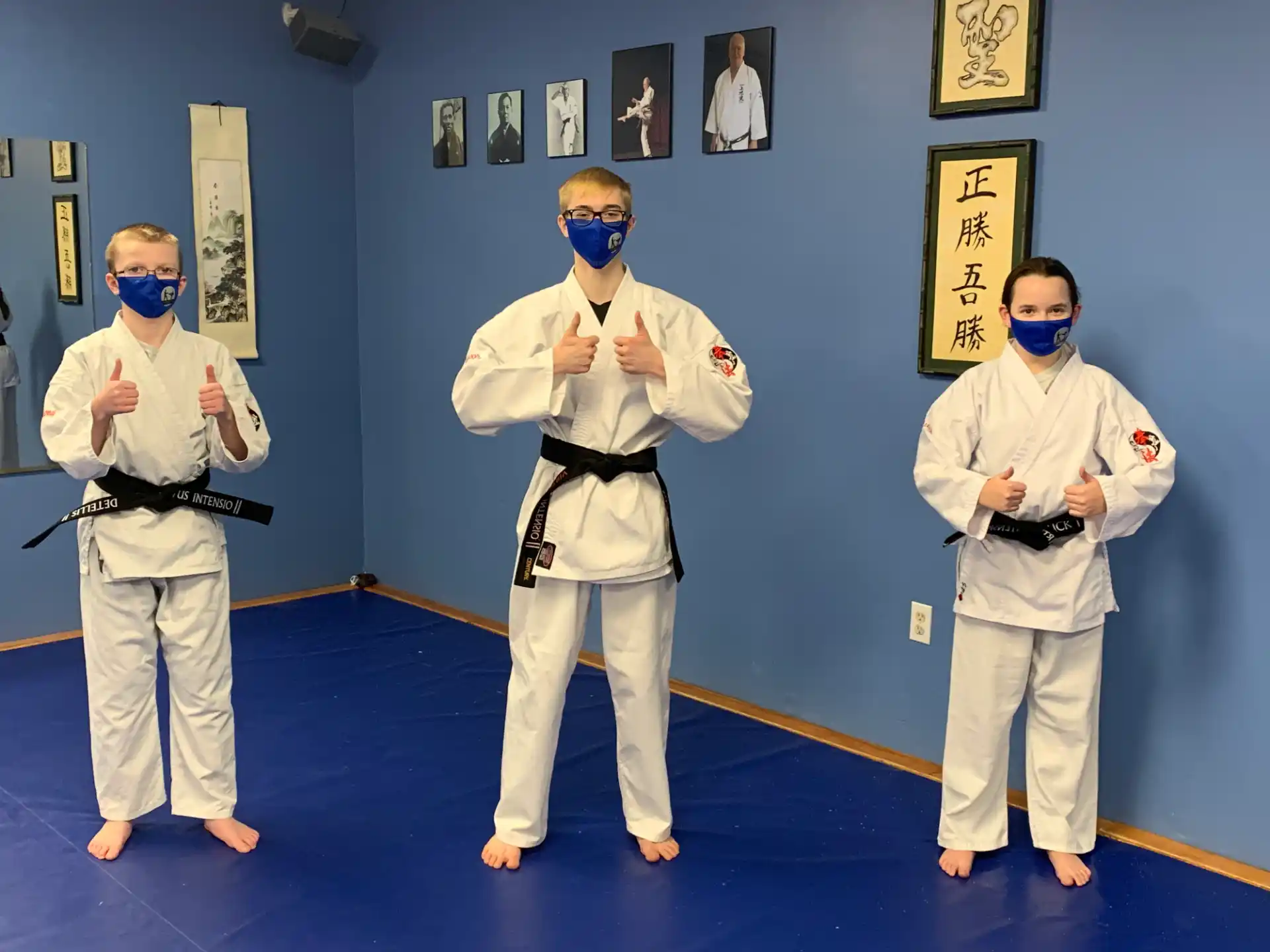 a group of people wearing masks