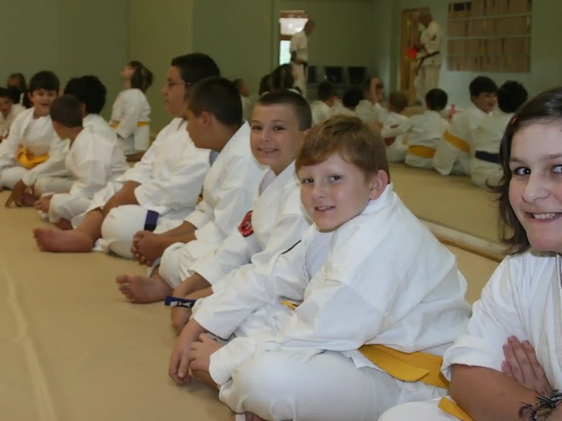 a group of people sitting on the floor