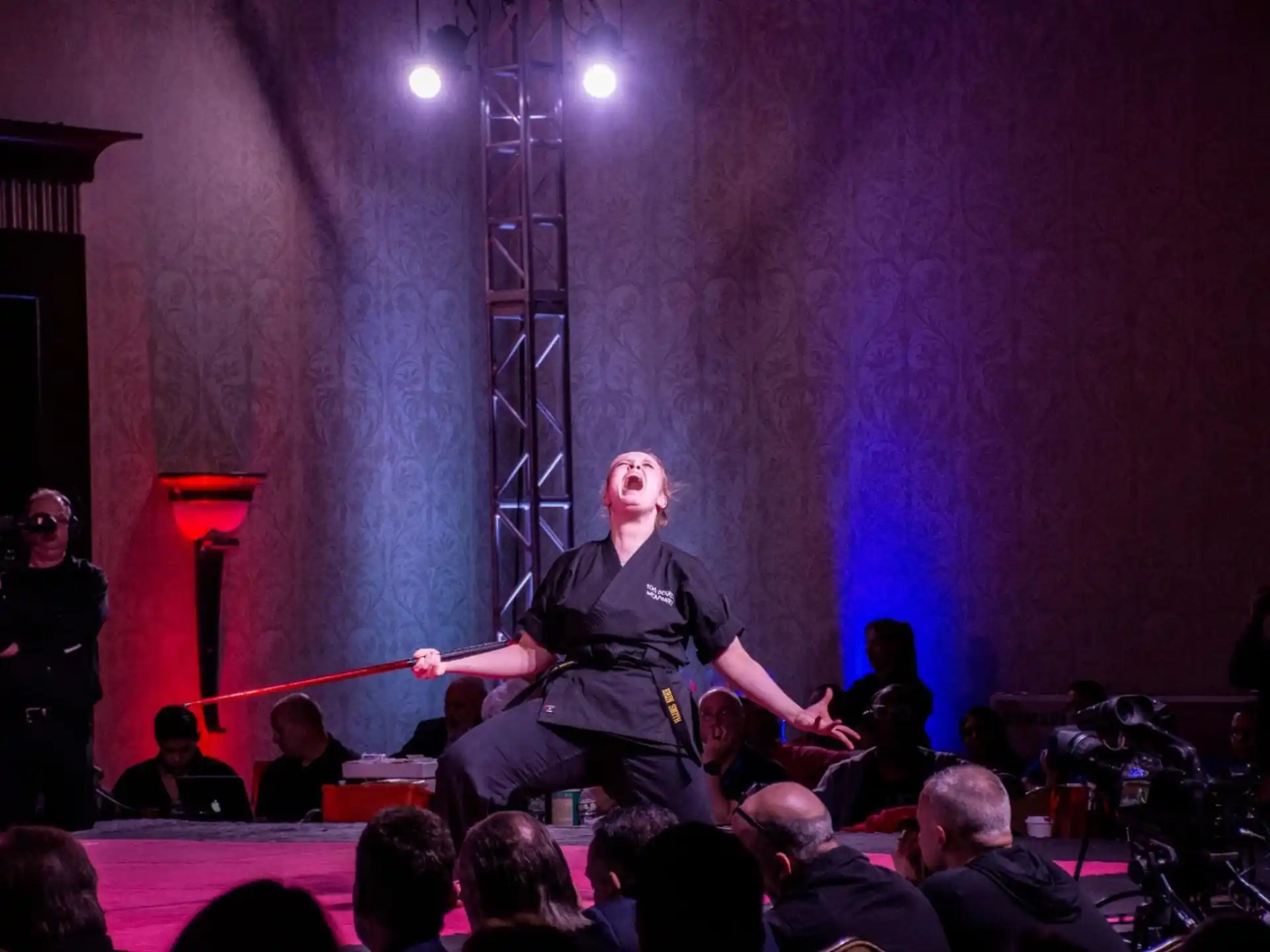 a man sitting on a stage