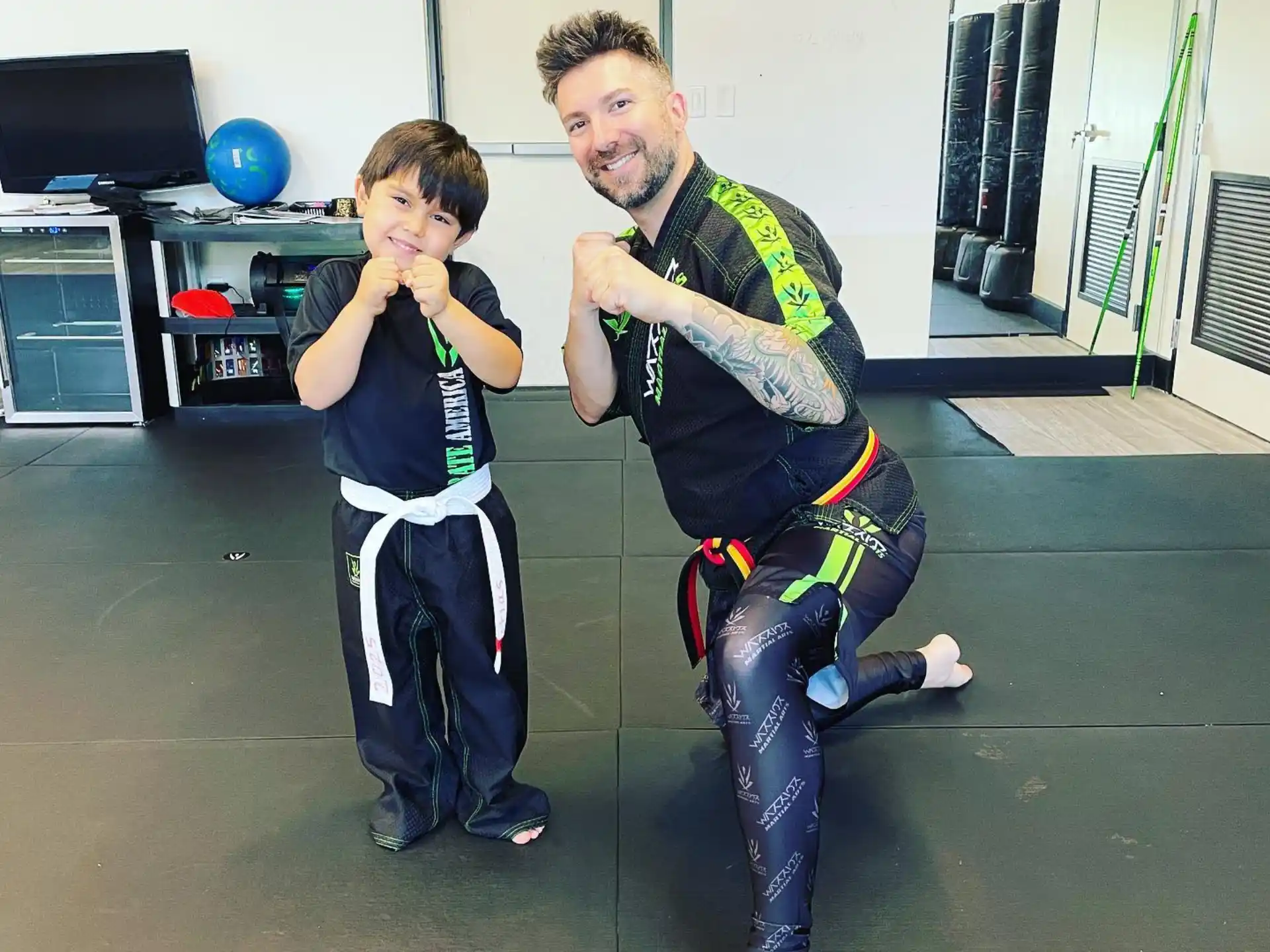 a person and a boy posing for a picture