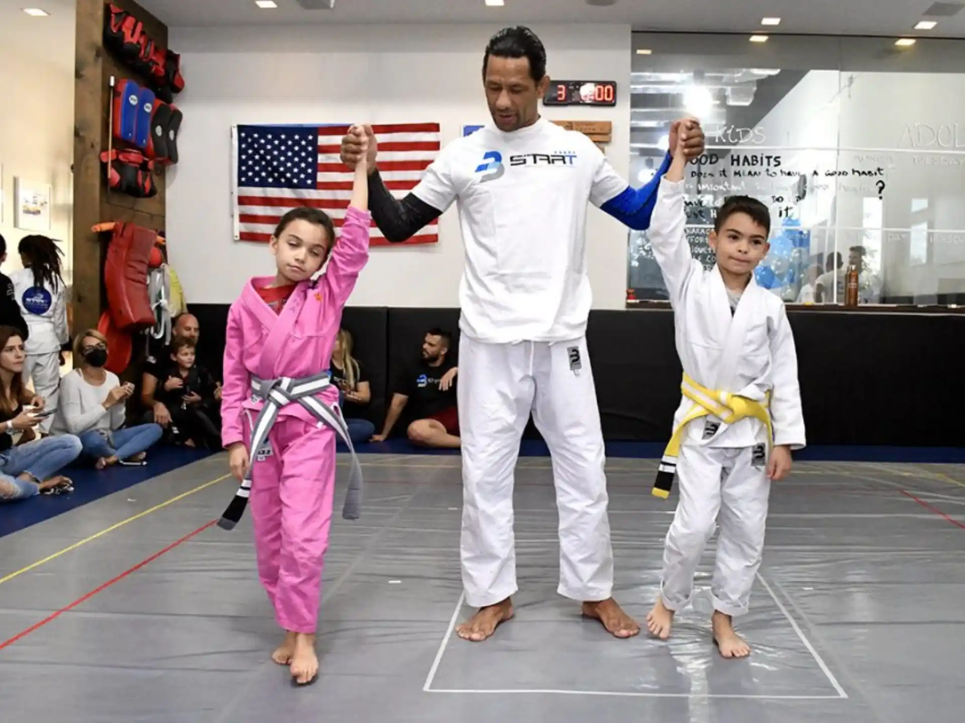 a group of people in karate uniforms
