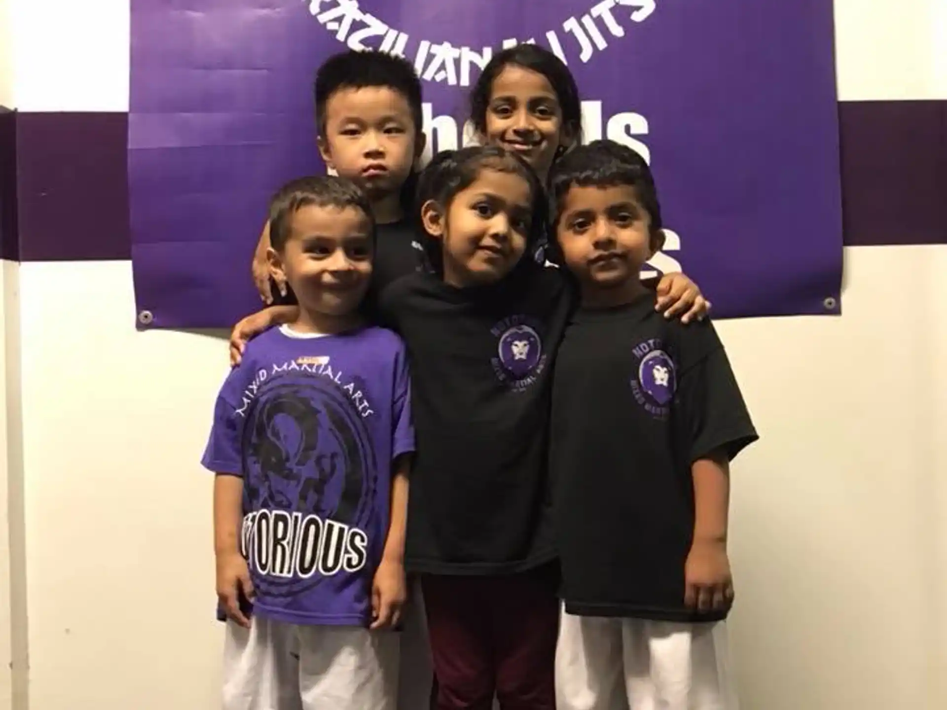 a group of children posing for a photo