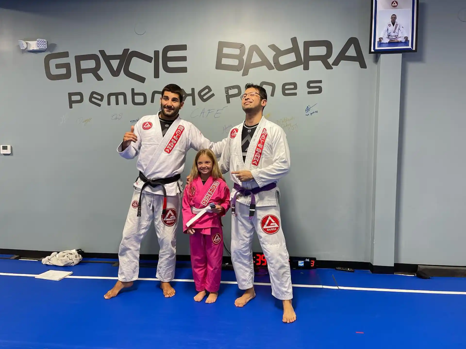 a group of people in karate uniforms