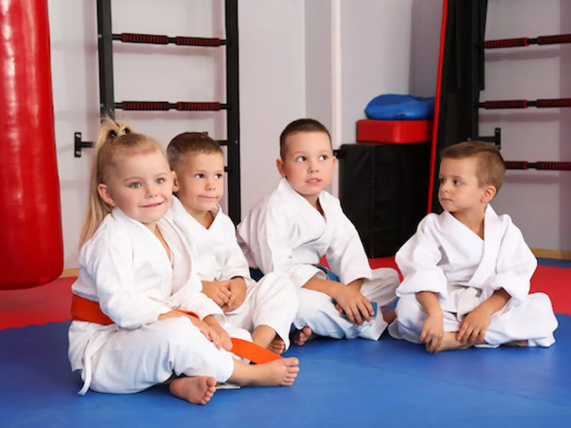 a group of children sitting on the floor