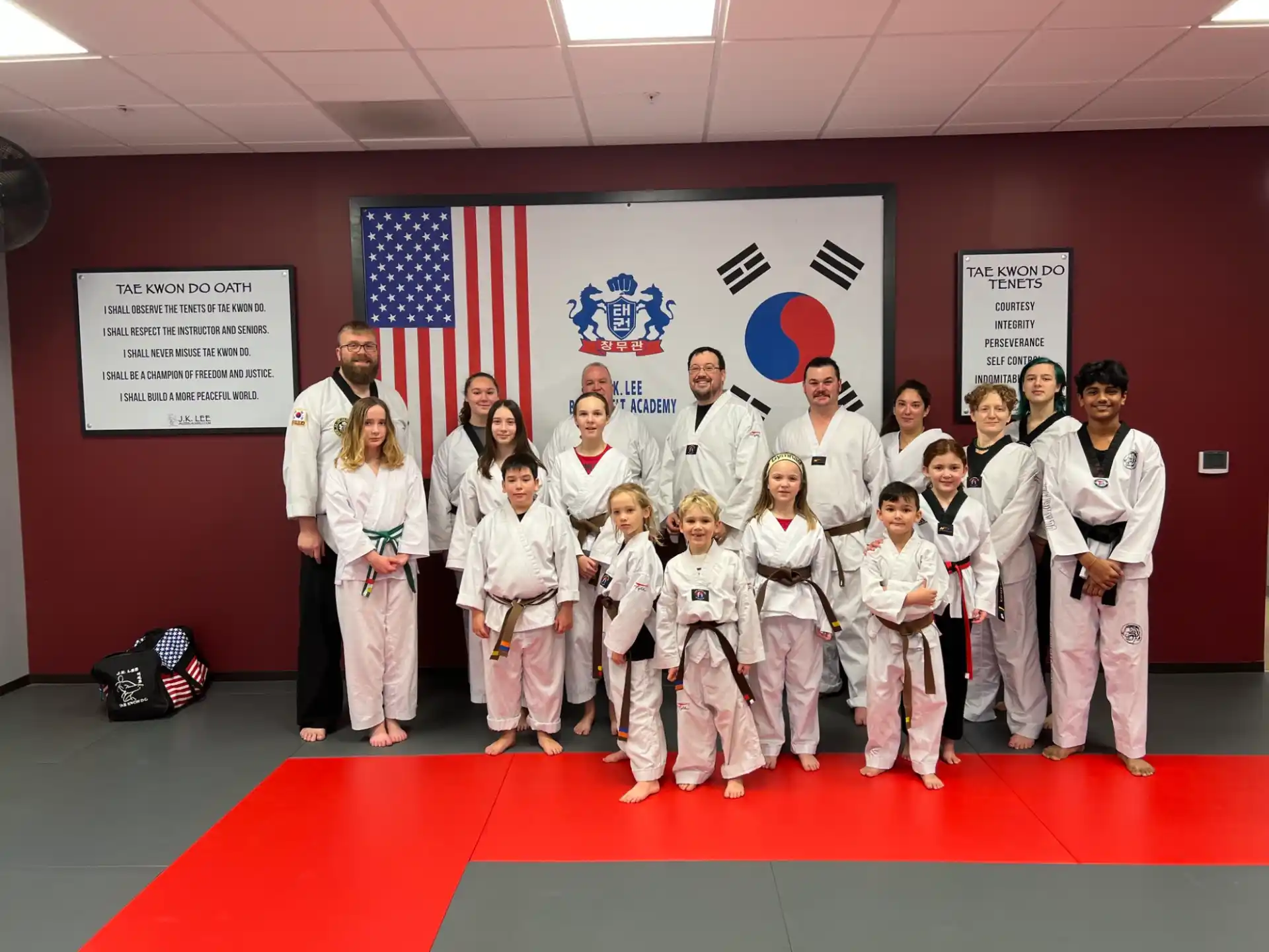 a group of people in karate uniforms