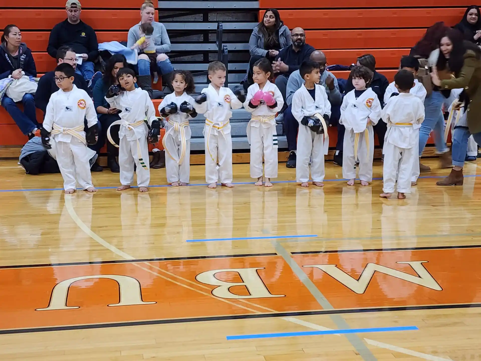 a group of people in white uniforms