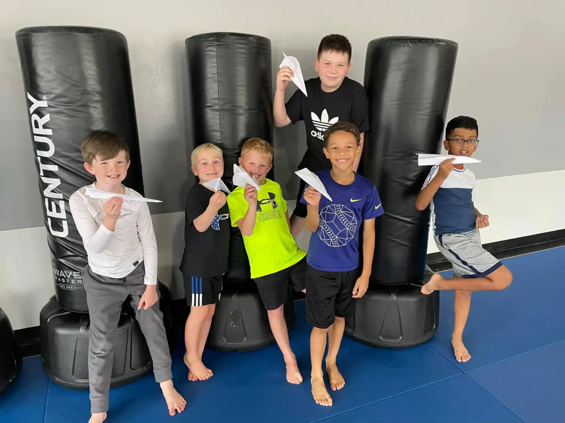 a group of kids posing for a photo