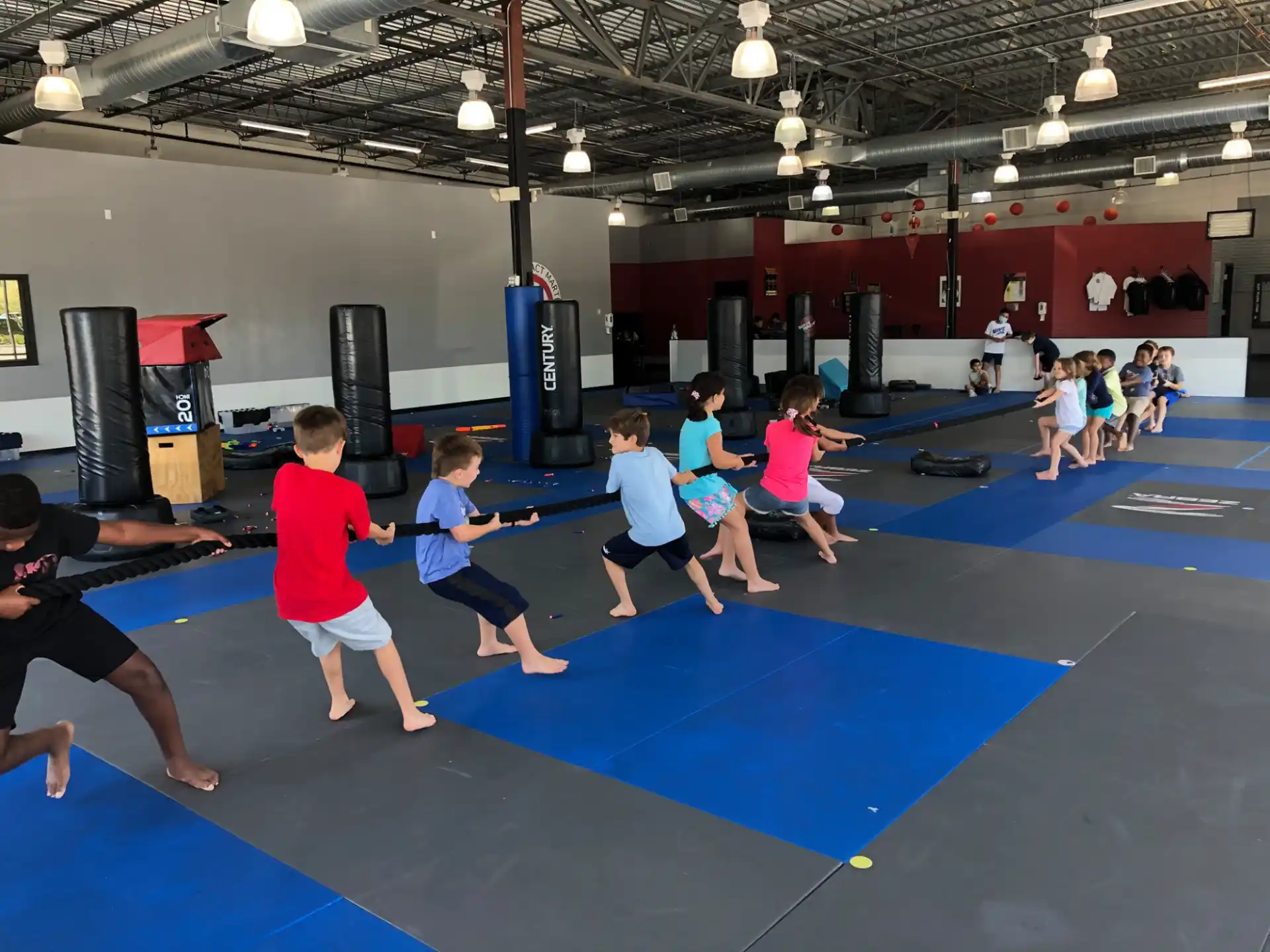 a group of people in a gym