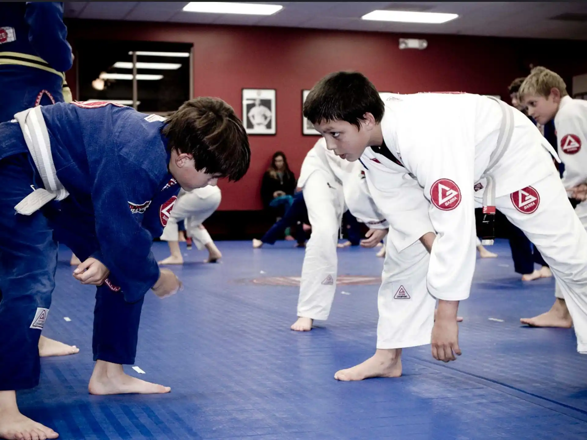 a group of people in karate uniforms