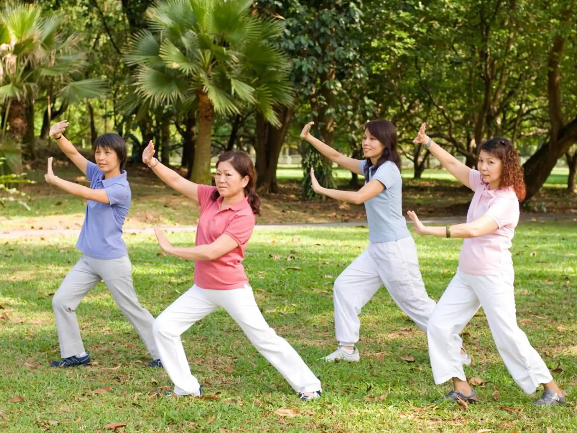 a group of people jumping in the air