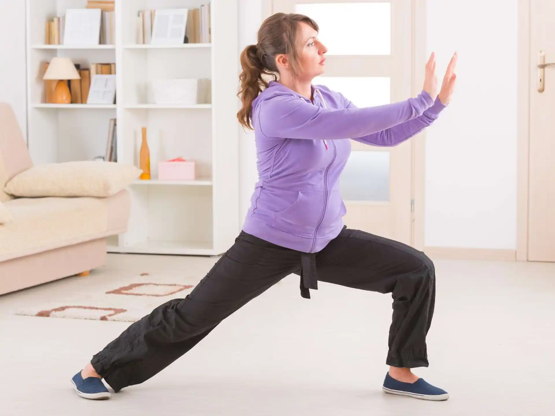 a woman stretching her leg