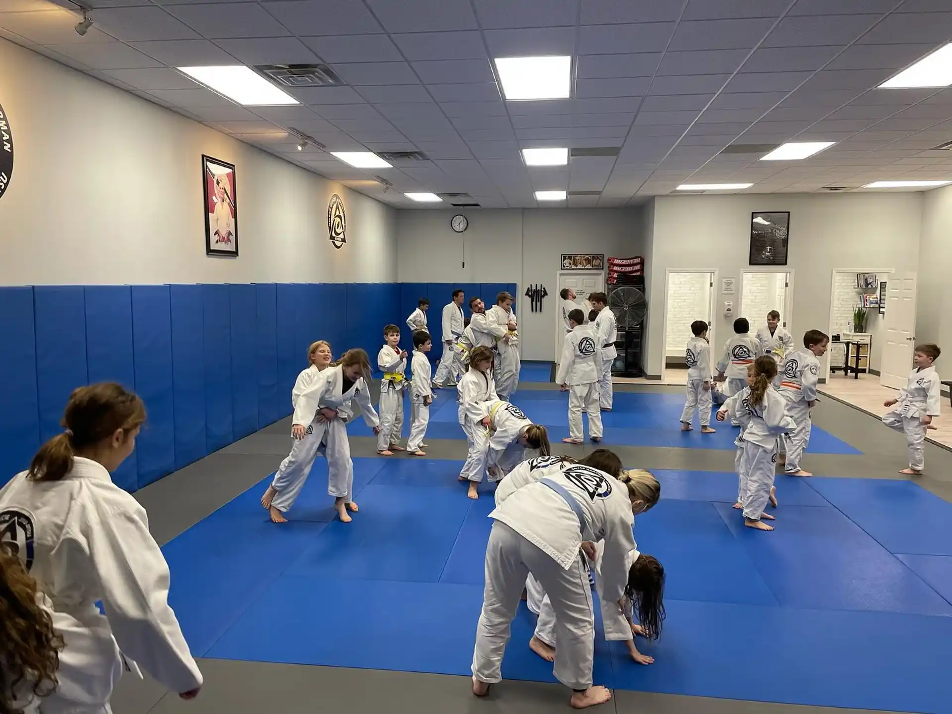 a group of children in a karate class