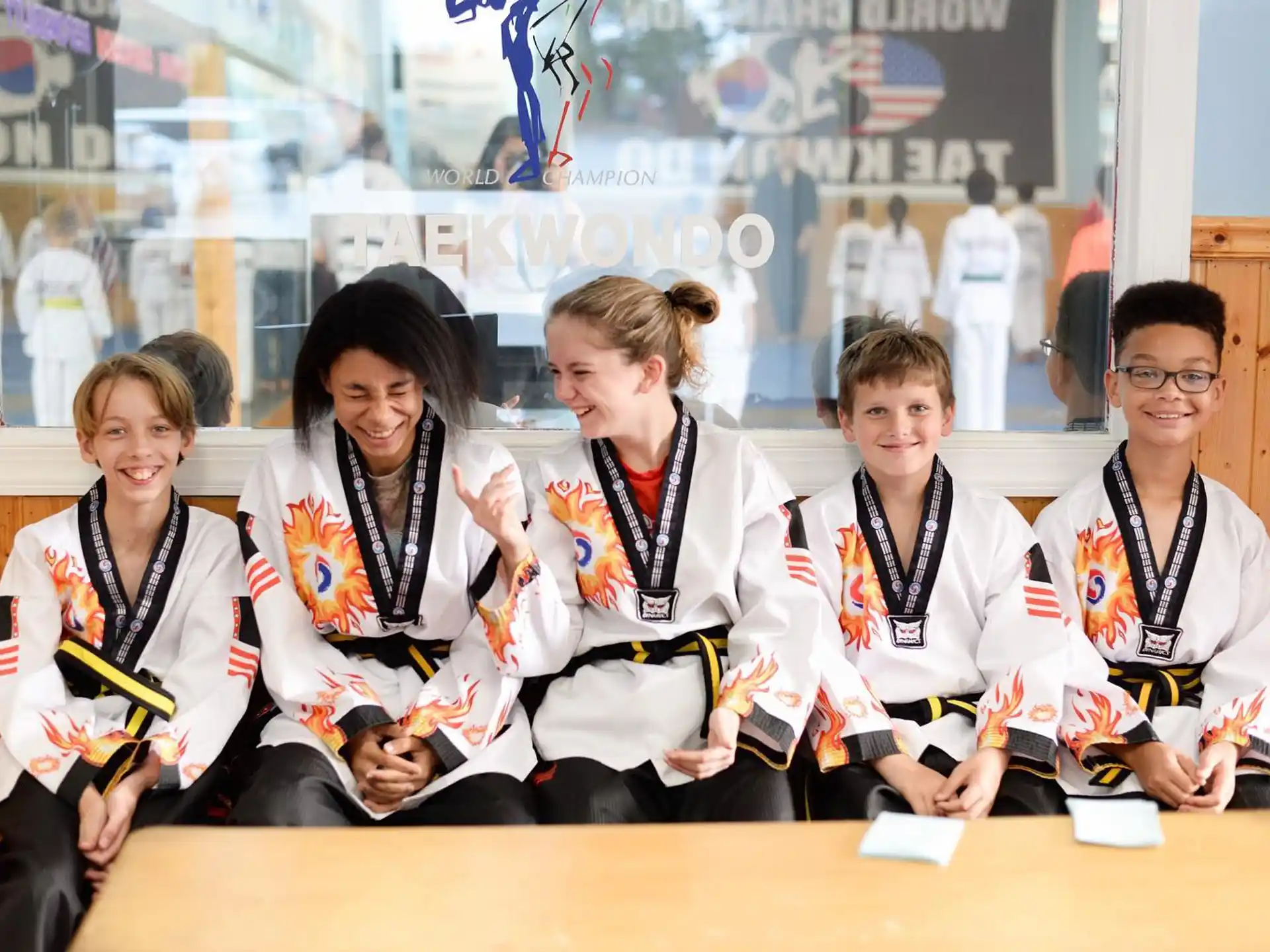a group of people wearing matching outfits