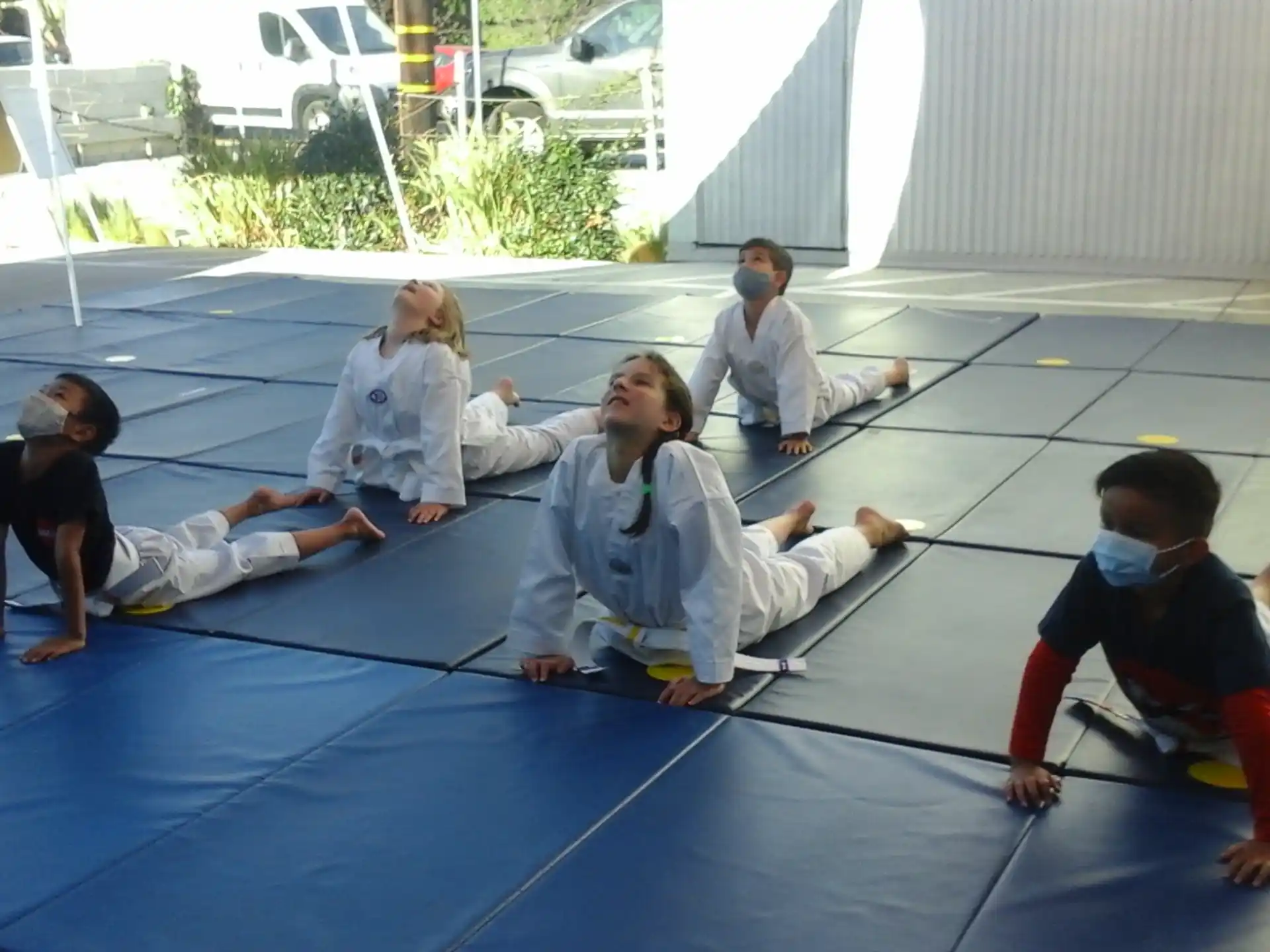 a group of people sitting on the ground