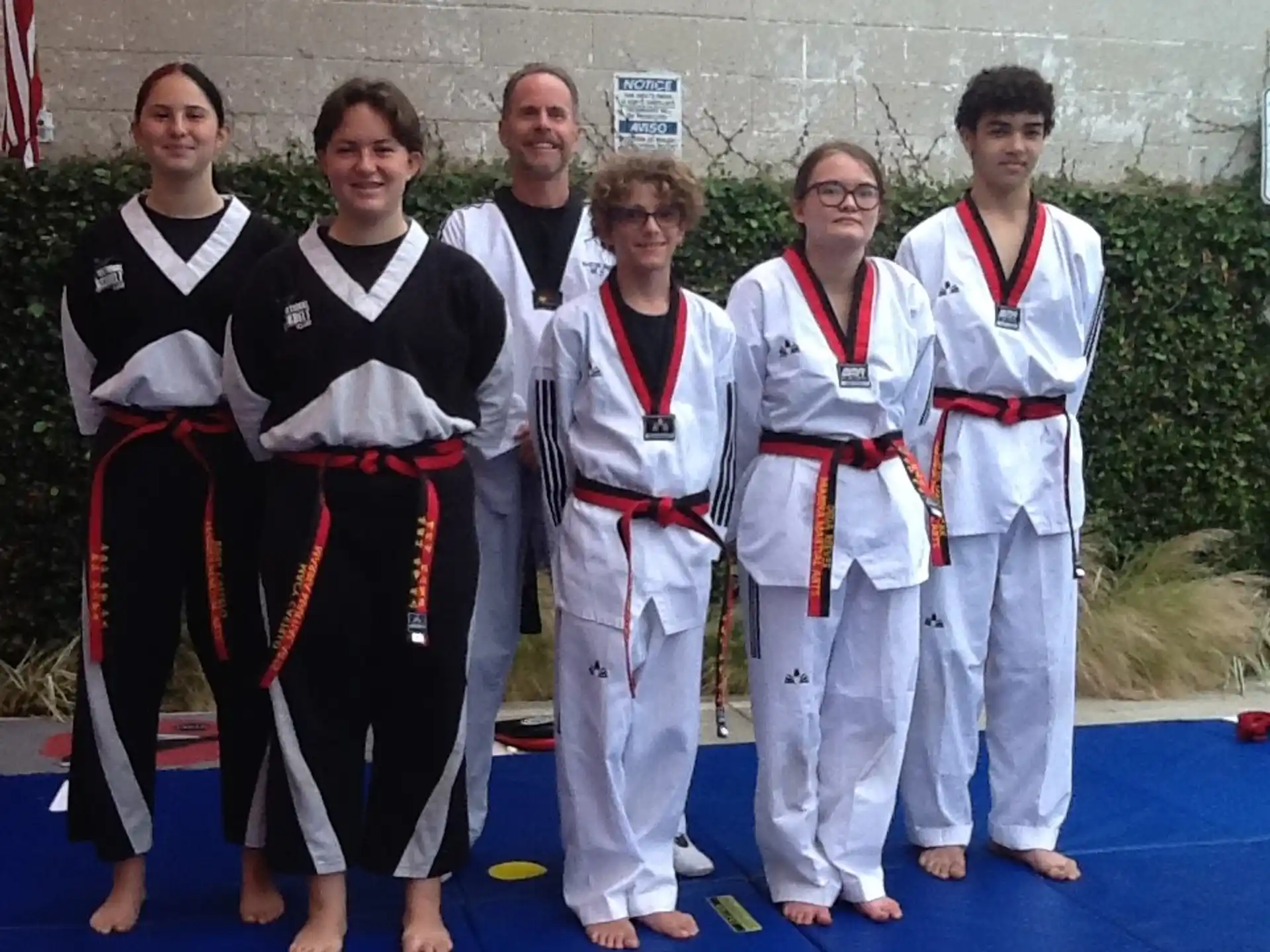 a group of people wearing karate uniforms