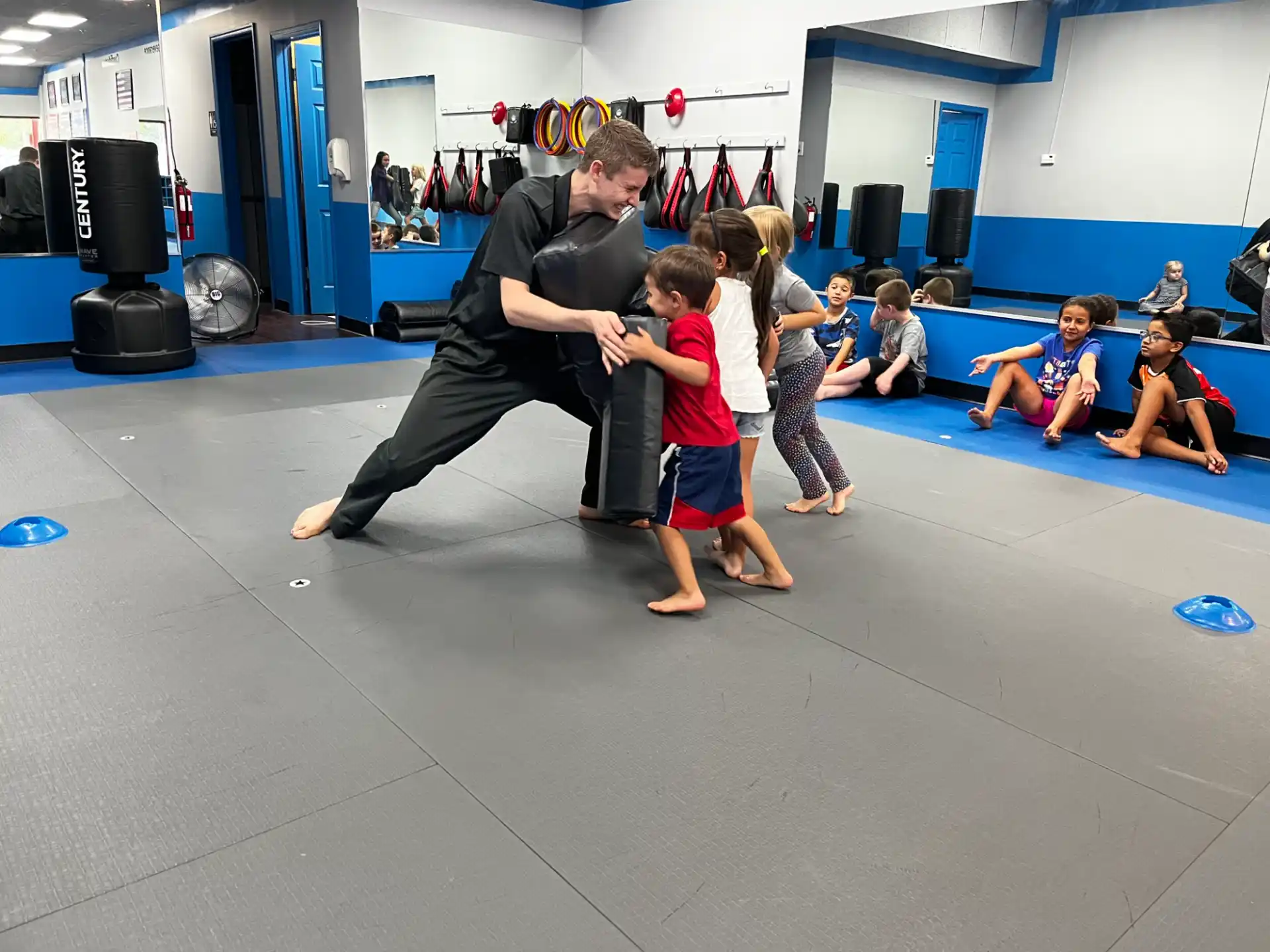 a person playing with kids