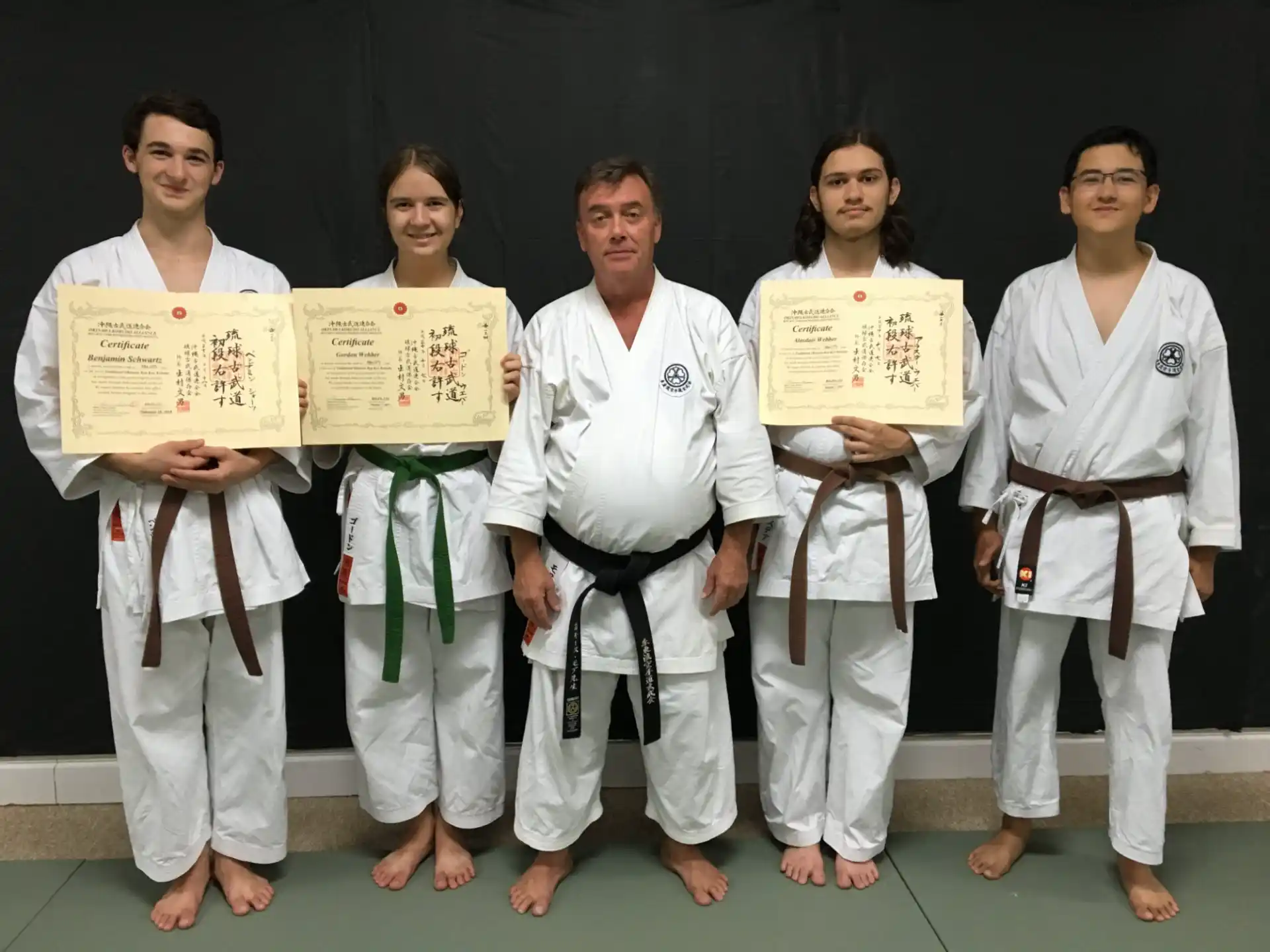 a group of people wearing karate uniforms