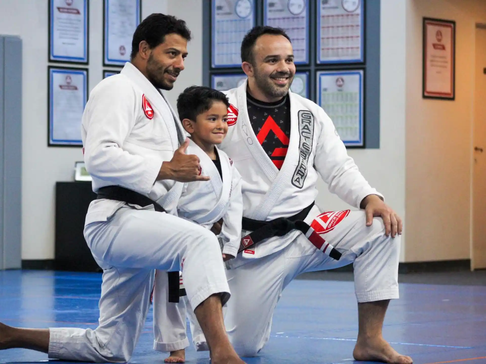 a group of men in karate uniforms
