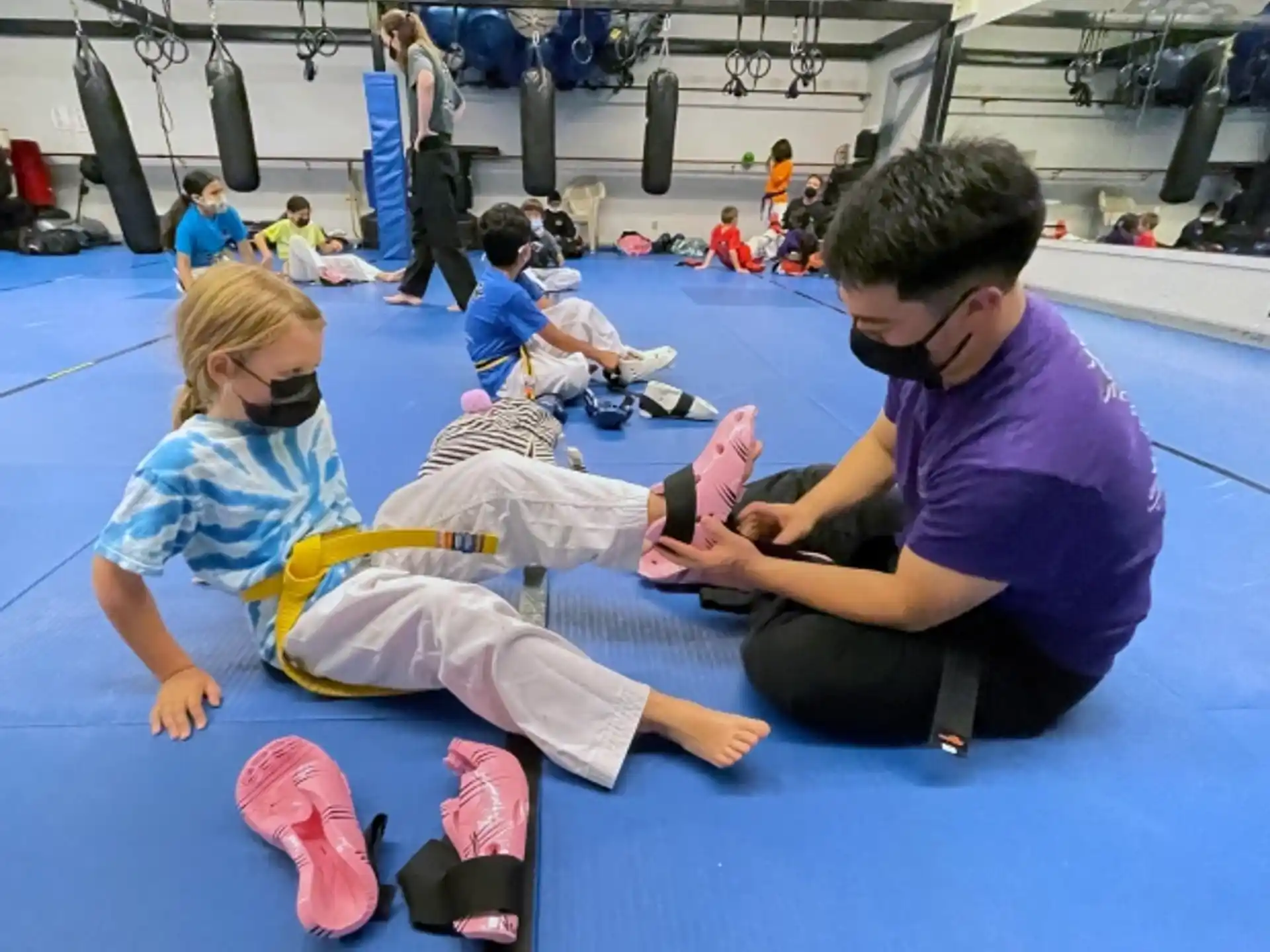a group of people sitting on the floor