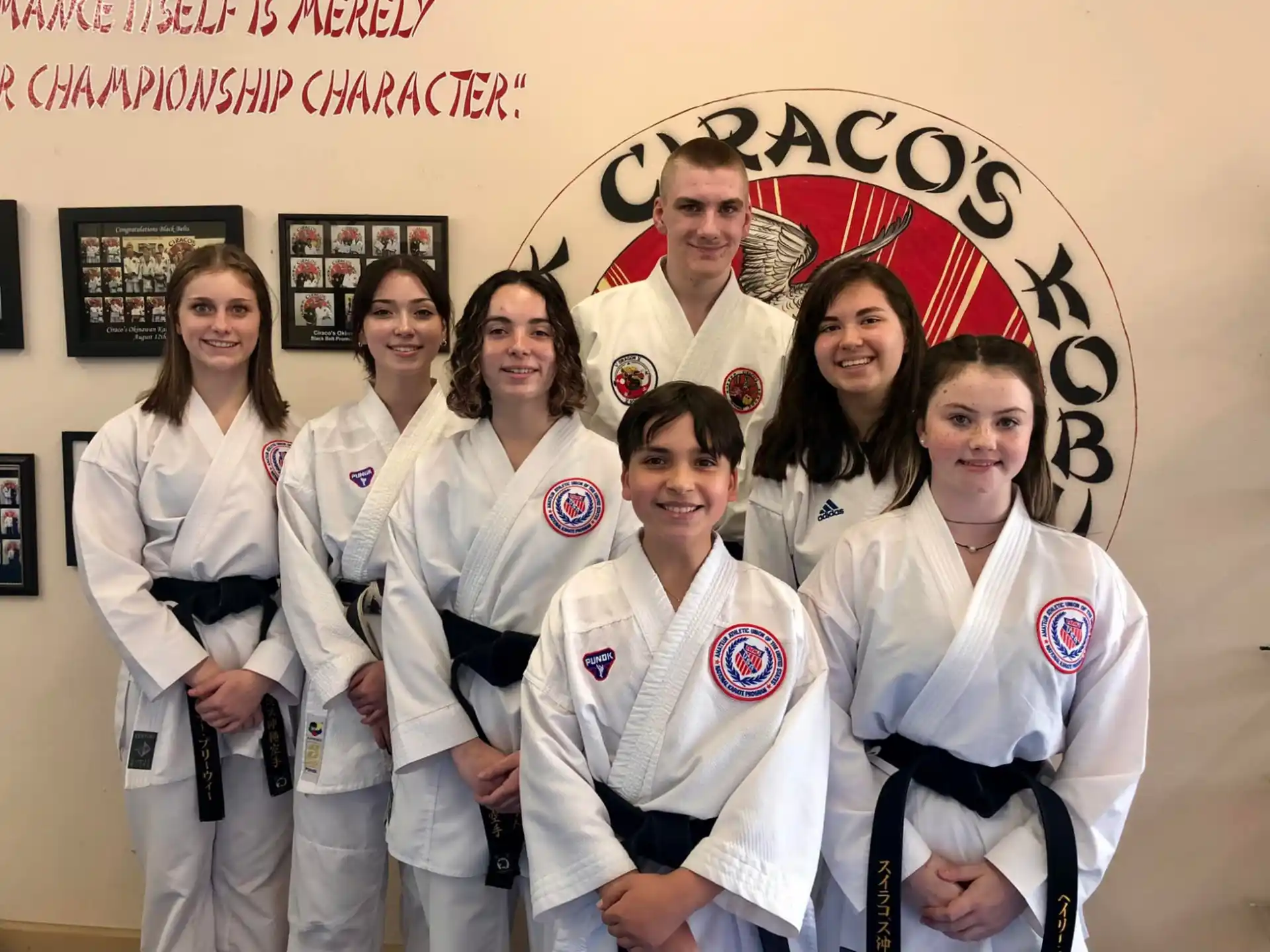 a group of women in white lab coats