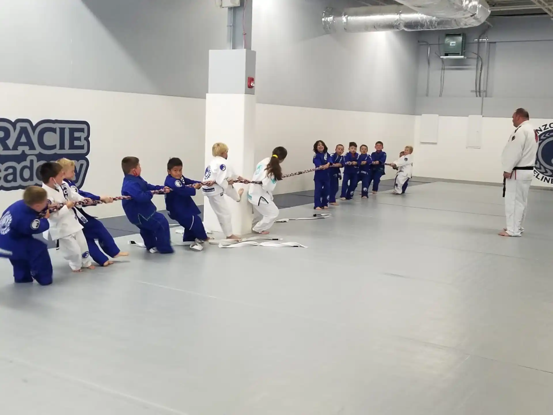 a group of people in karate uniforms