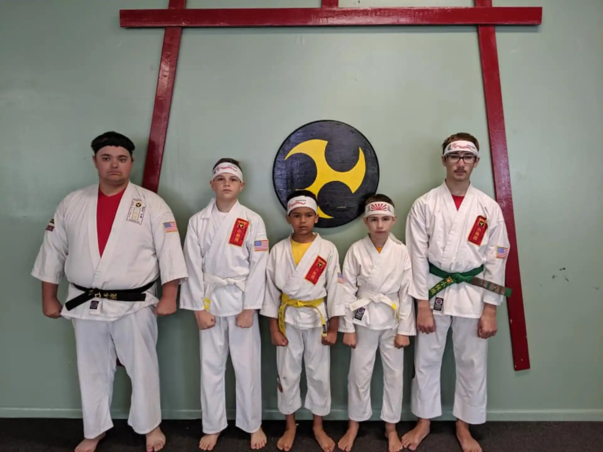 a group of people in white uniforms