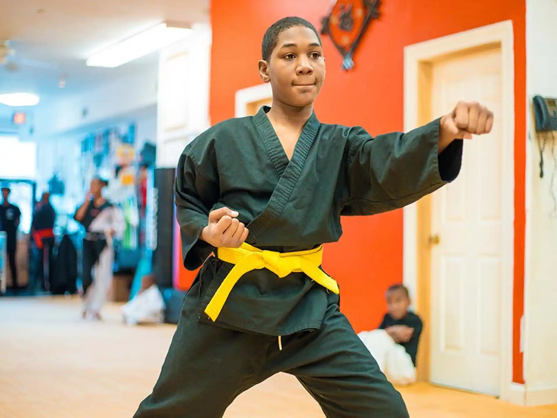 a person in a martial arts uniform