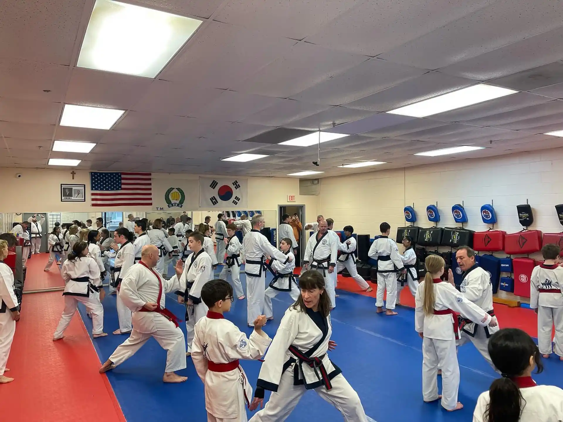 a group of people in karate uniforms