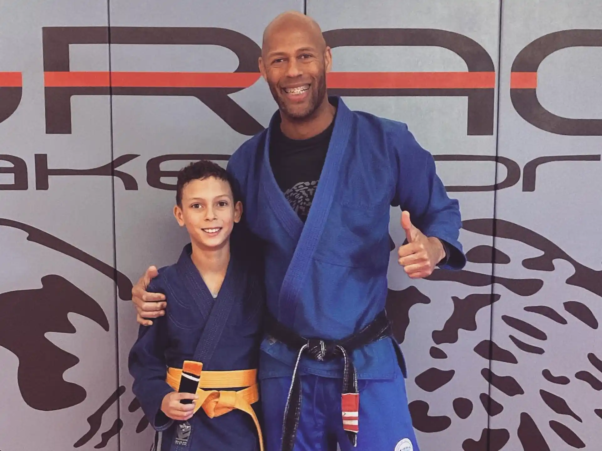 a man and a boy posing for a picture