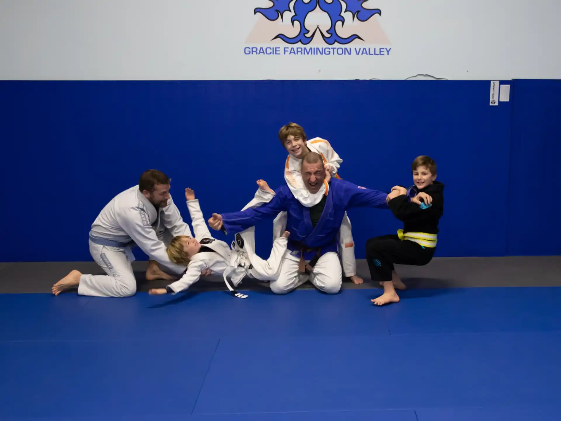 a group of people in a martial arts class