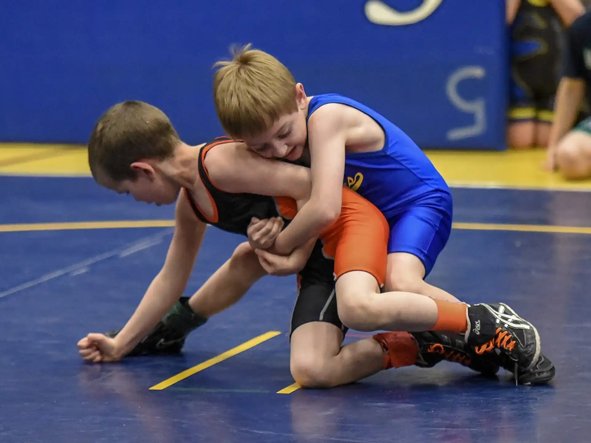 two boys playing a sport