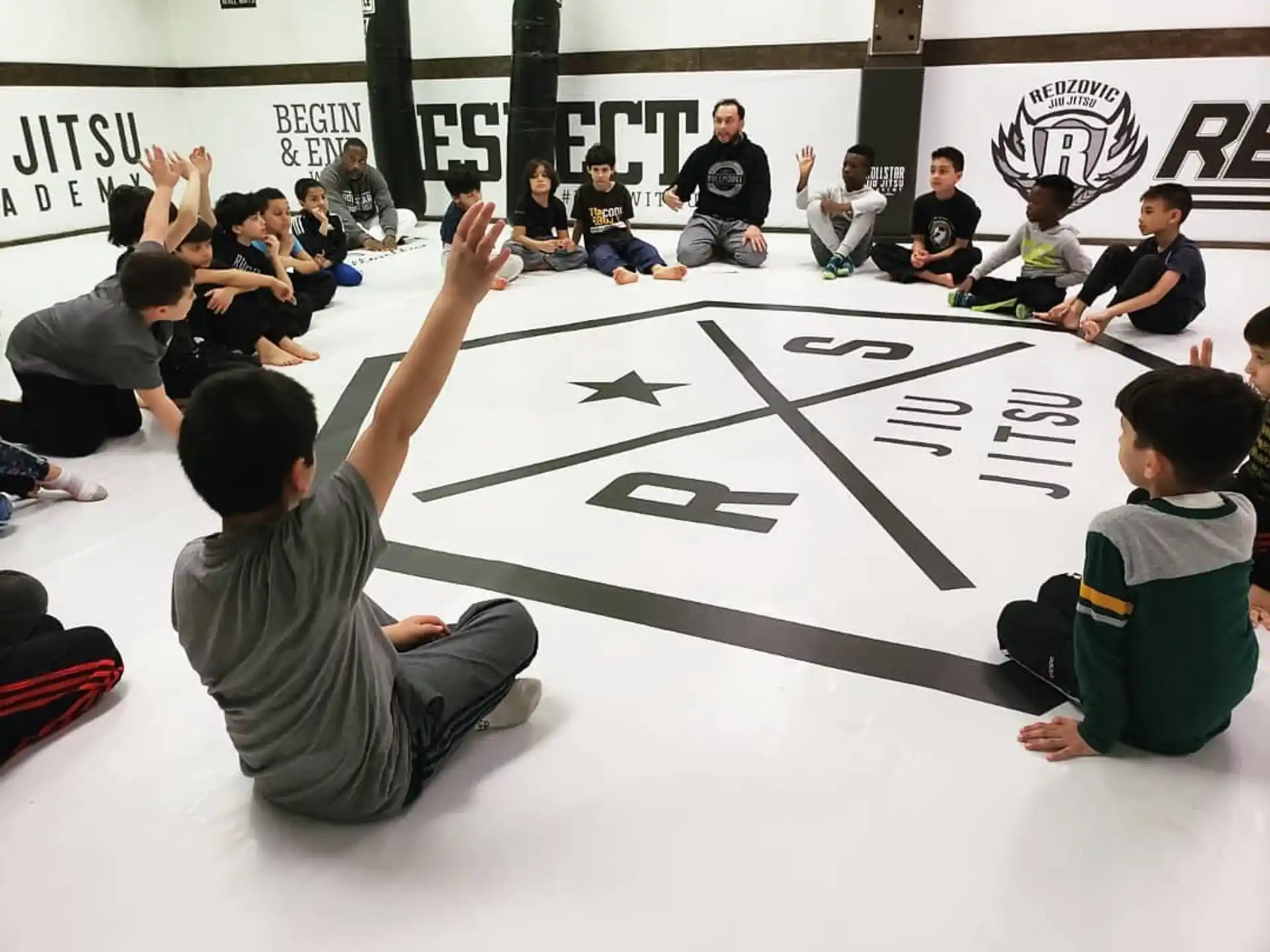 a group of people sitting on the floor