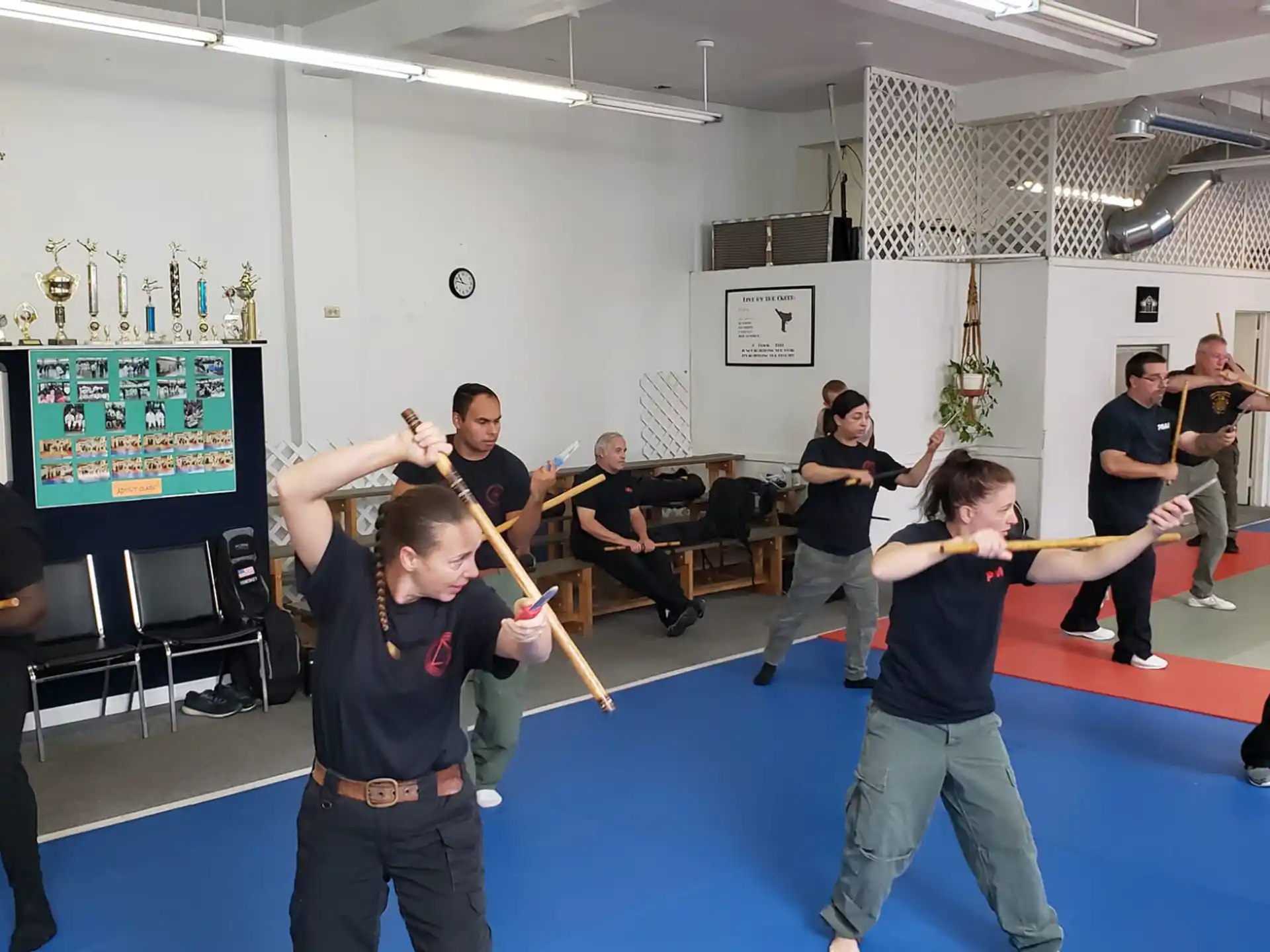 a group of people holding swords