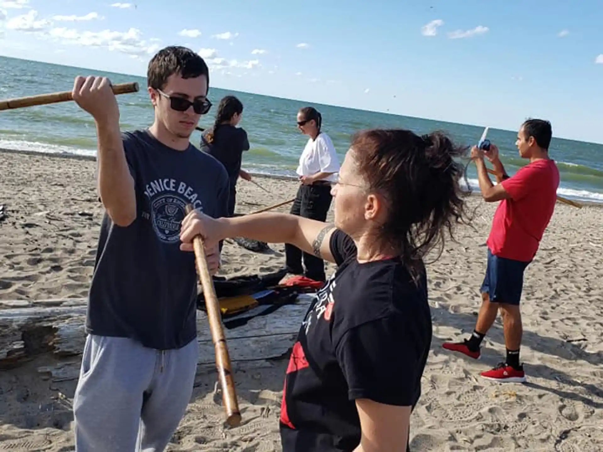a group of people on a beach