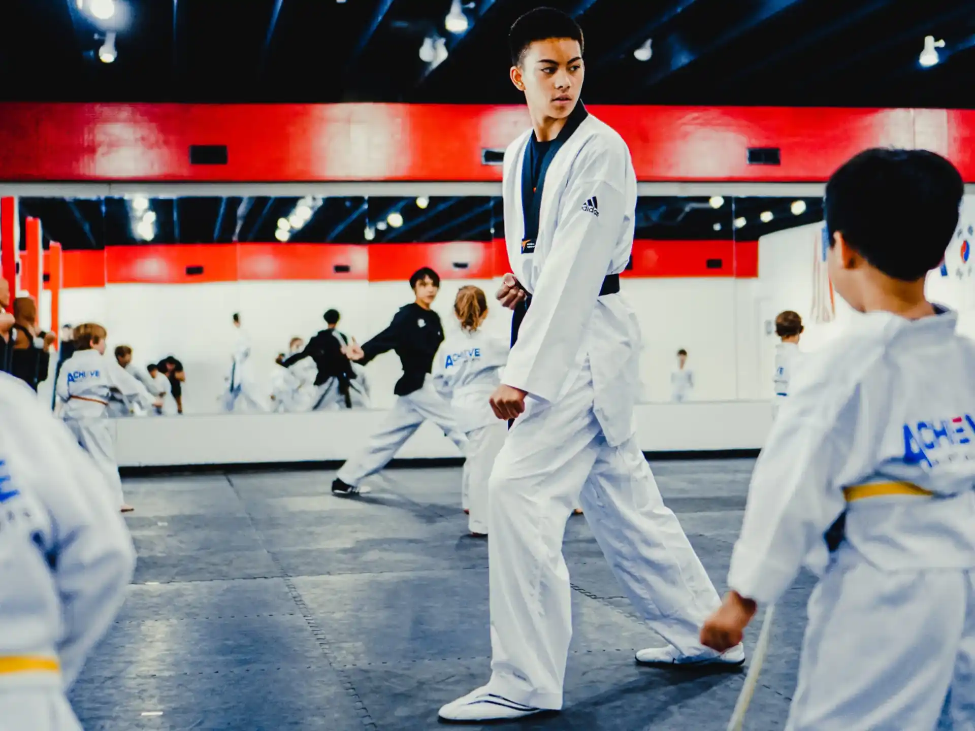 a group of people in white uniforms