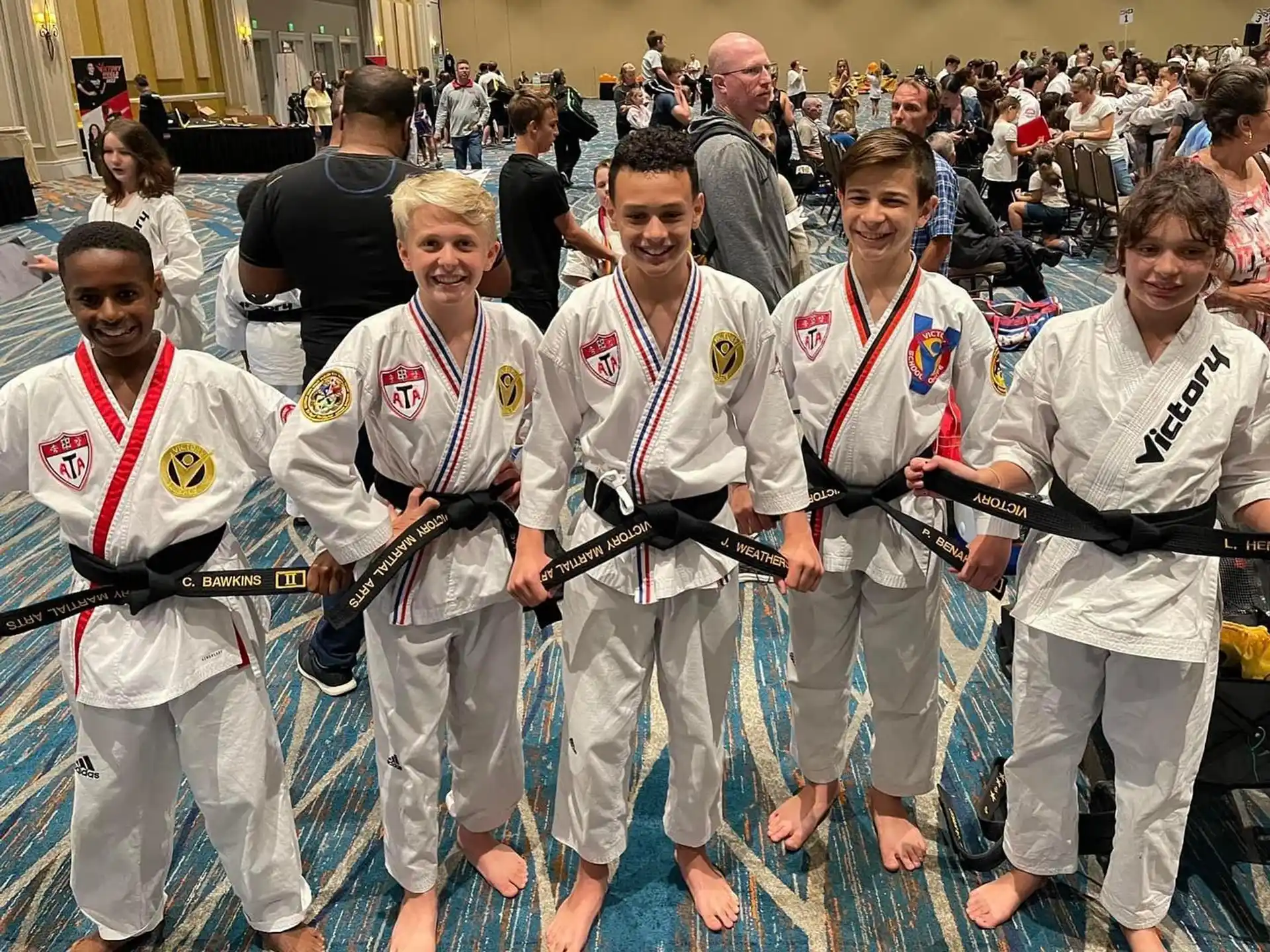 a group of people wearing karate uniforms