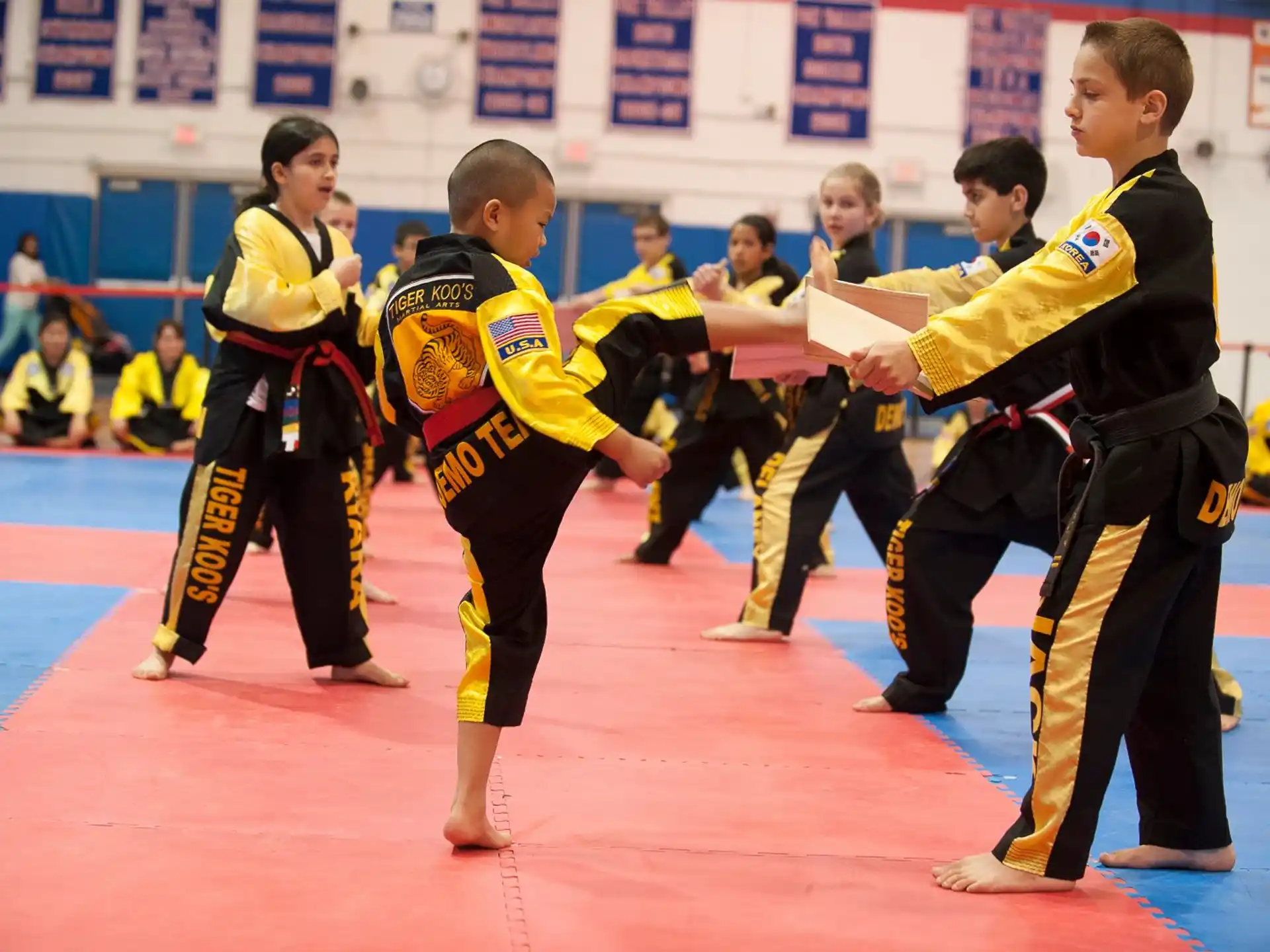 a group of people in yellow uniforms