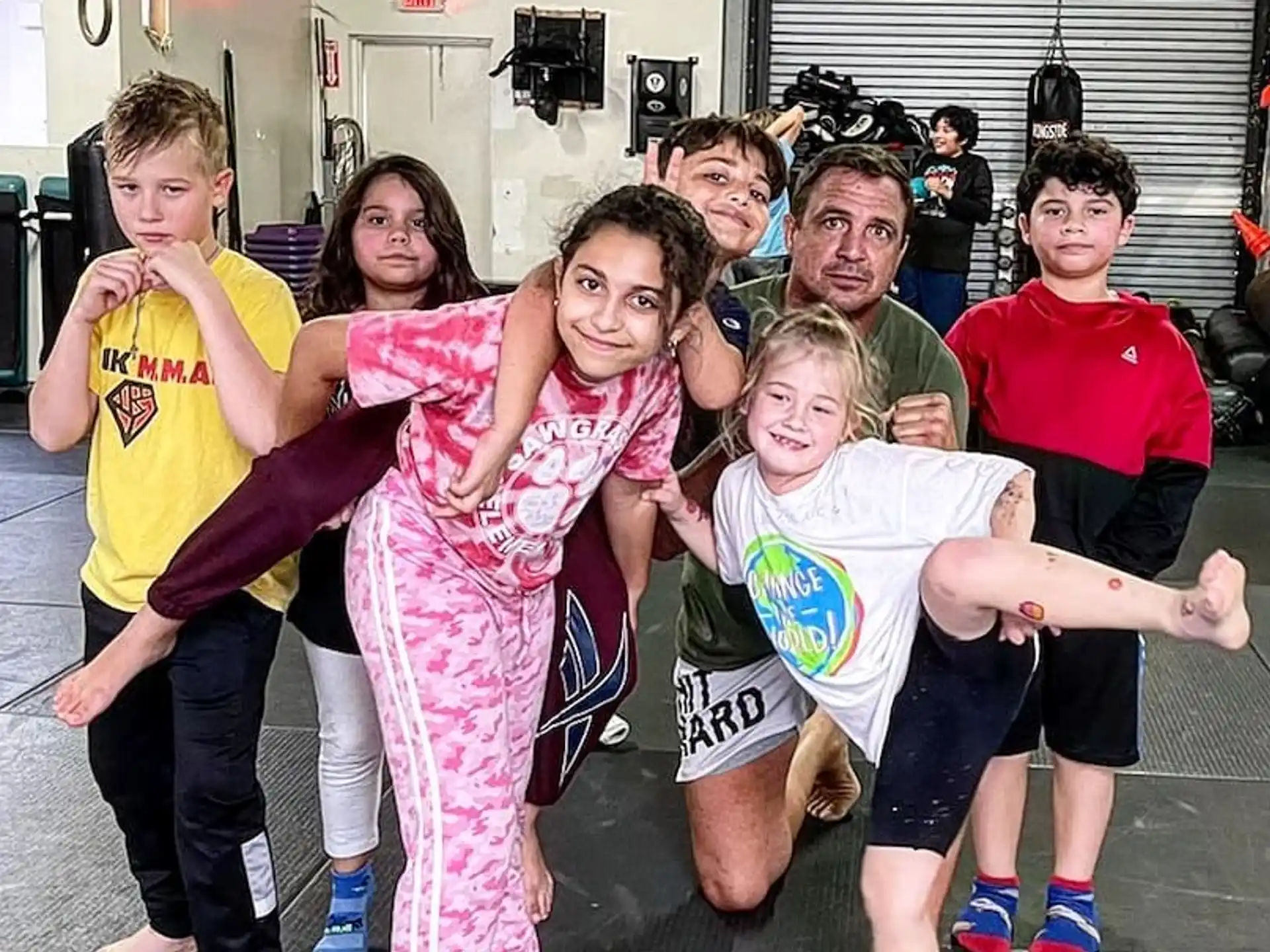 a group of children posing for a photo