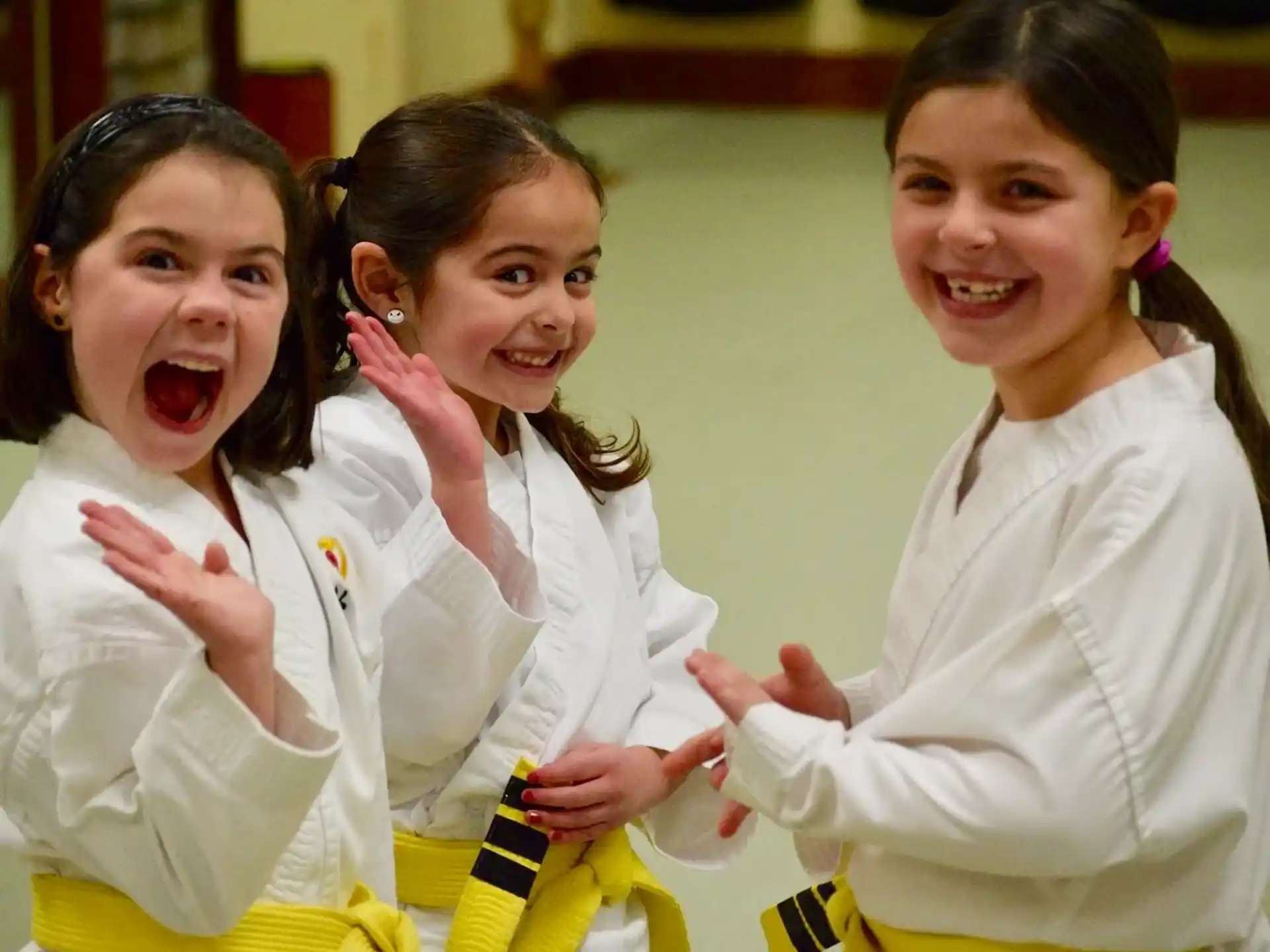 a group of girls in white uniforms