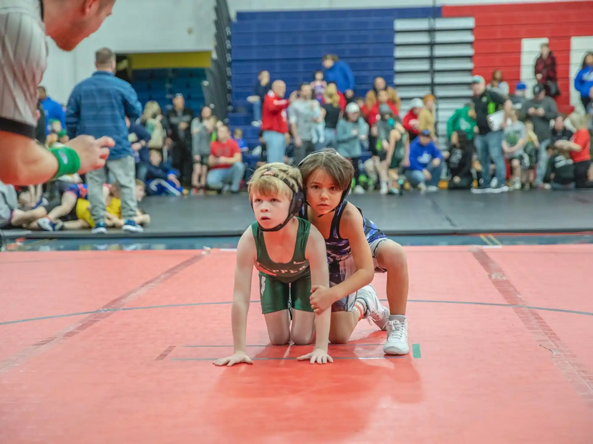 a couple of girls on a mat