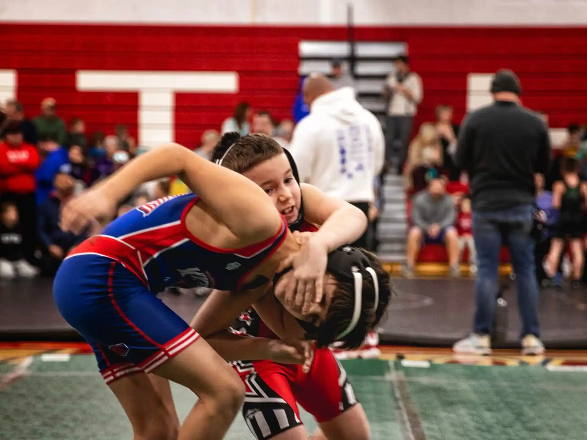 a couple of men wrestling
