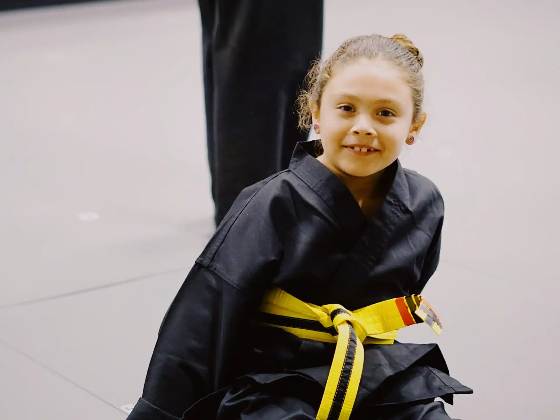a girl in a black coat
