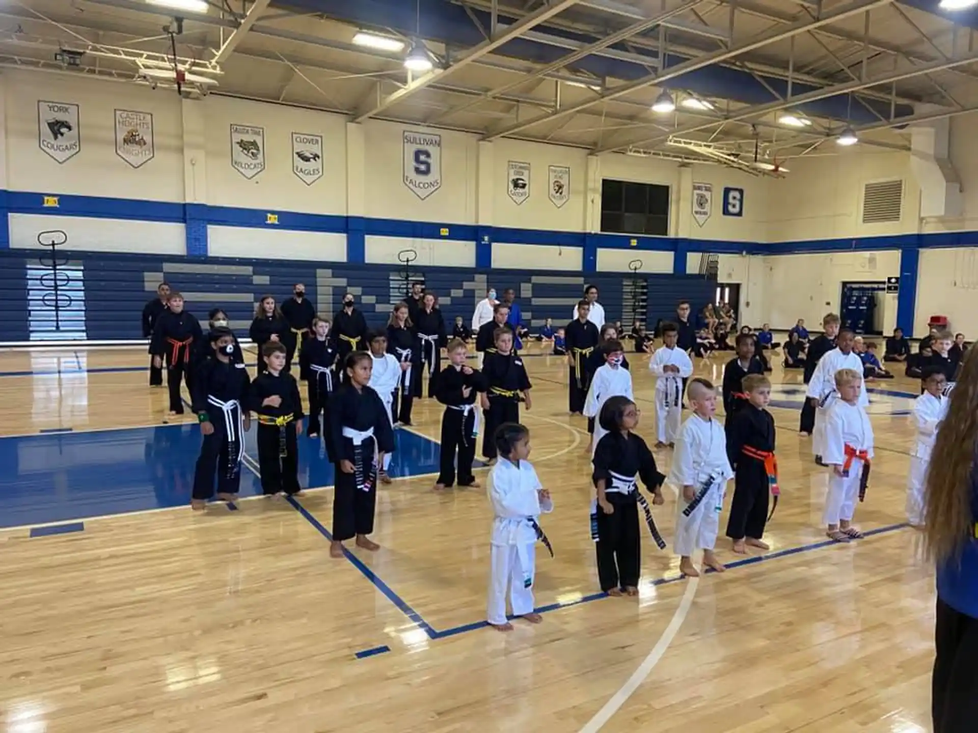 a group of people in a gym