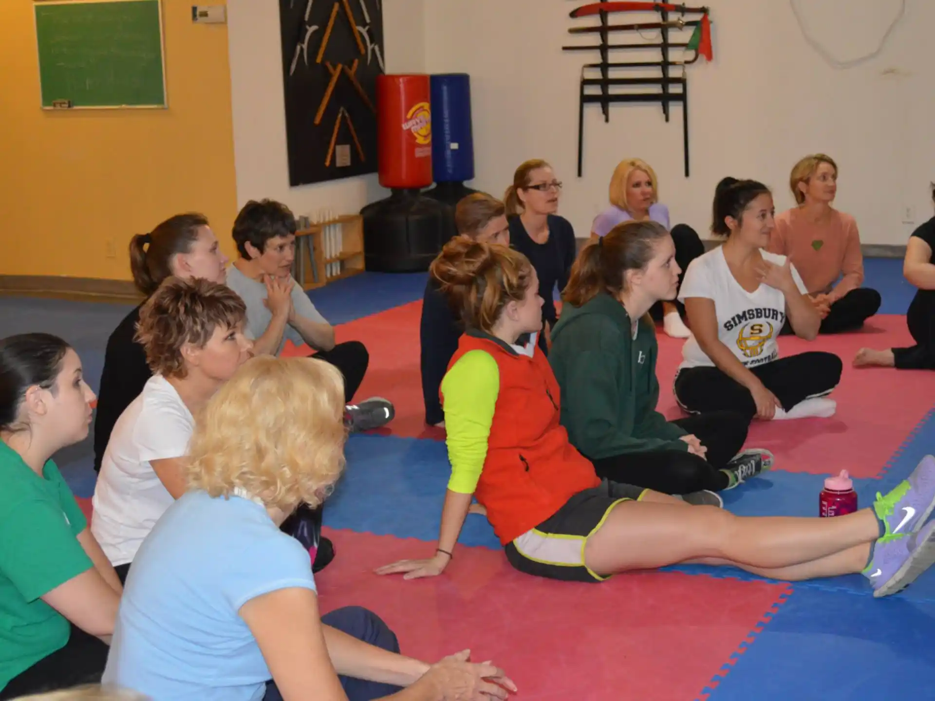 a group of people sitting on the floor
