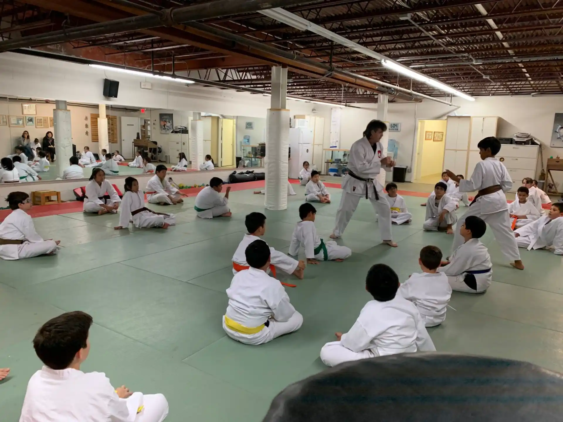 a group of people sitting on the floor