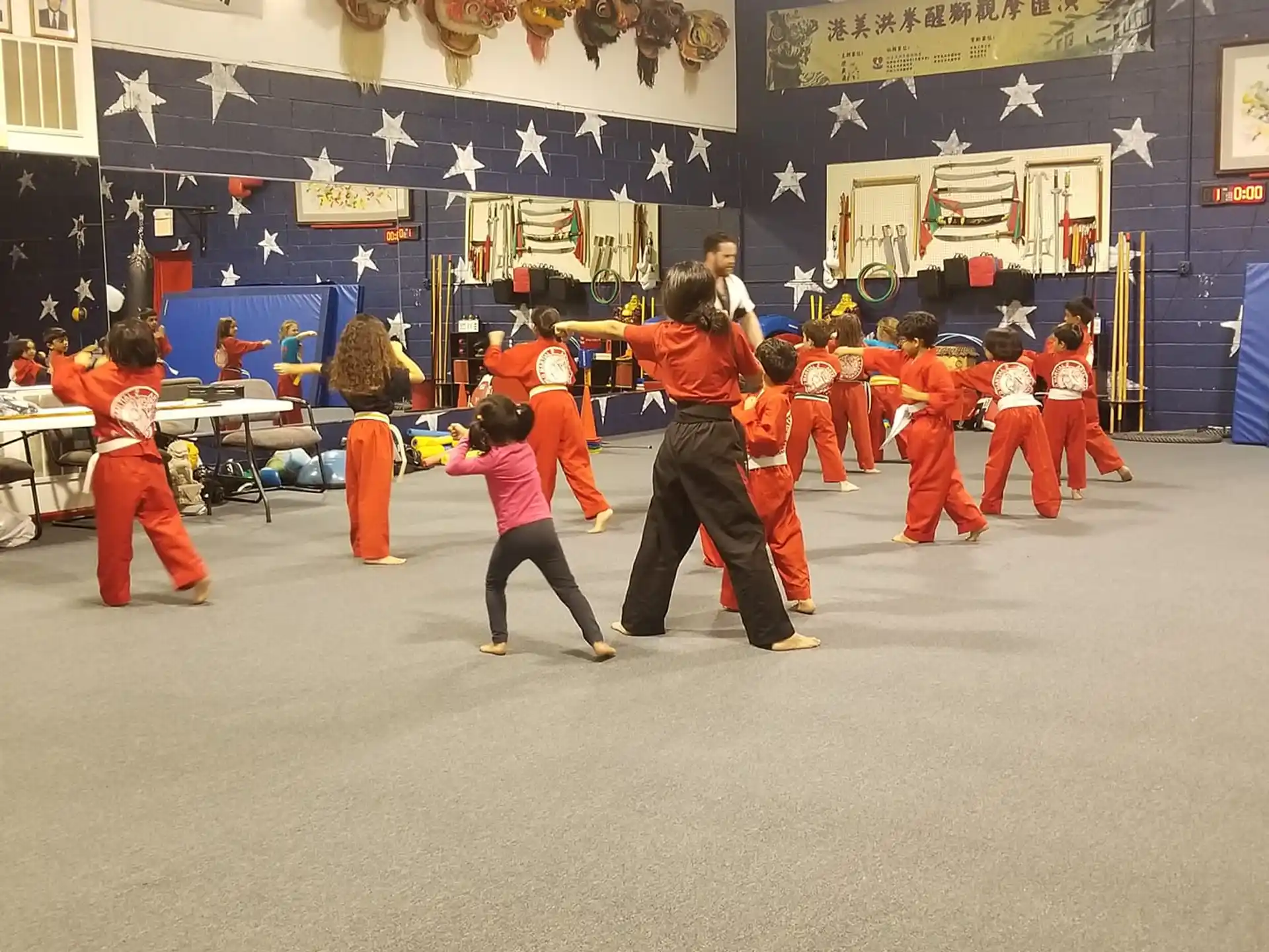 a group of people in red uniforms