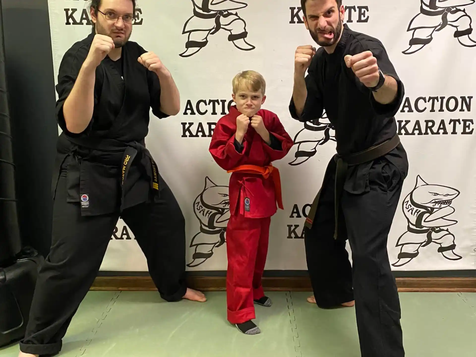 a person and a boy posing for a picture