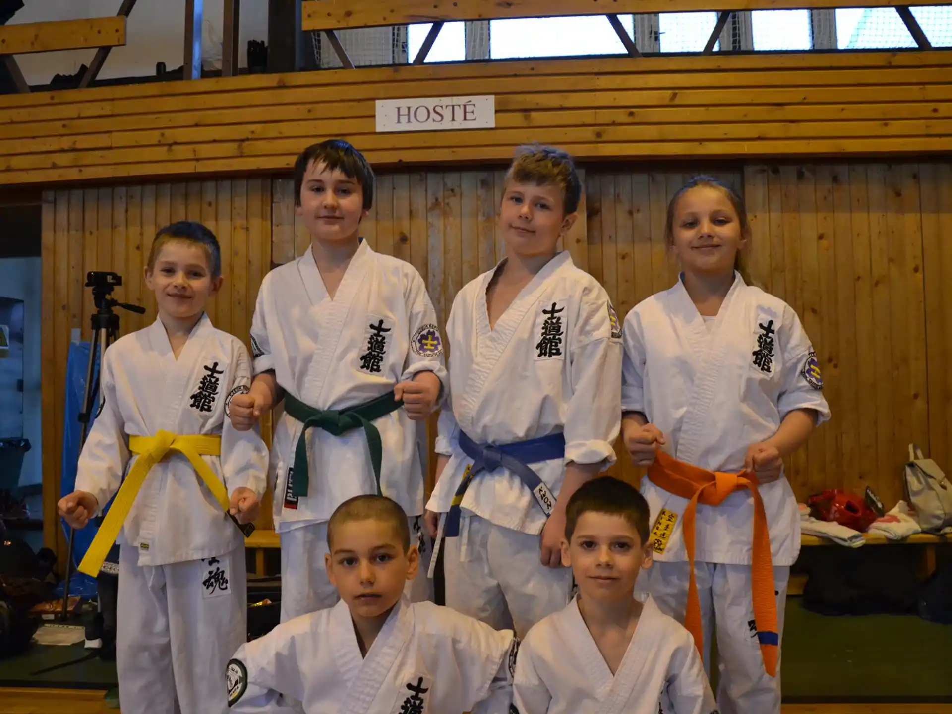 a group of people in karate uniforms